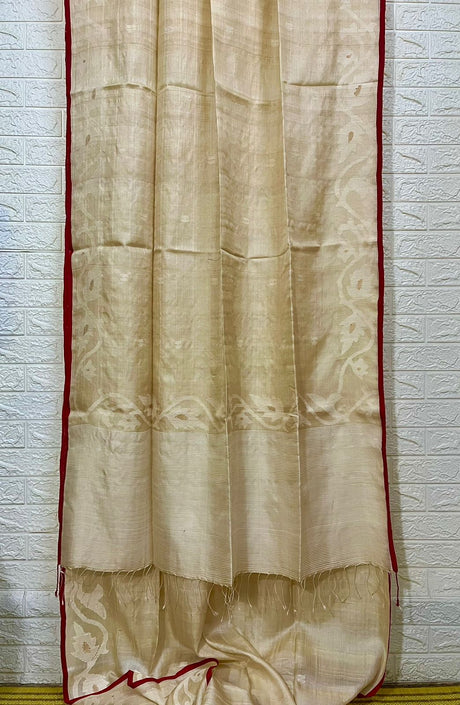Alpona motifs handwoven jamdani saree in tusser silk with red border