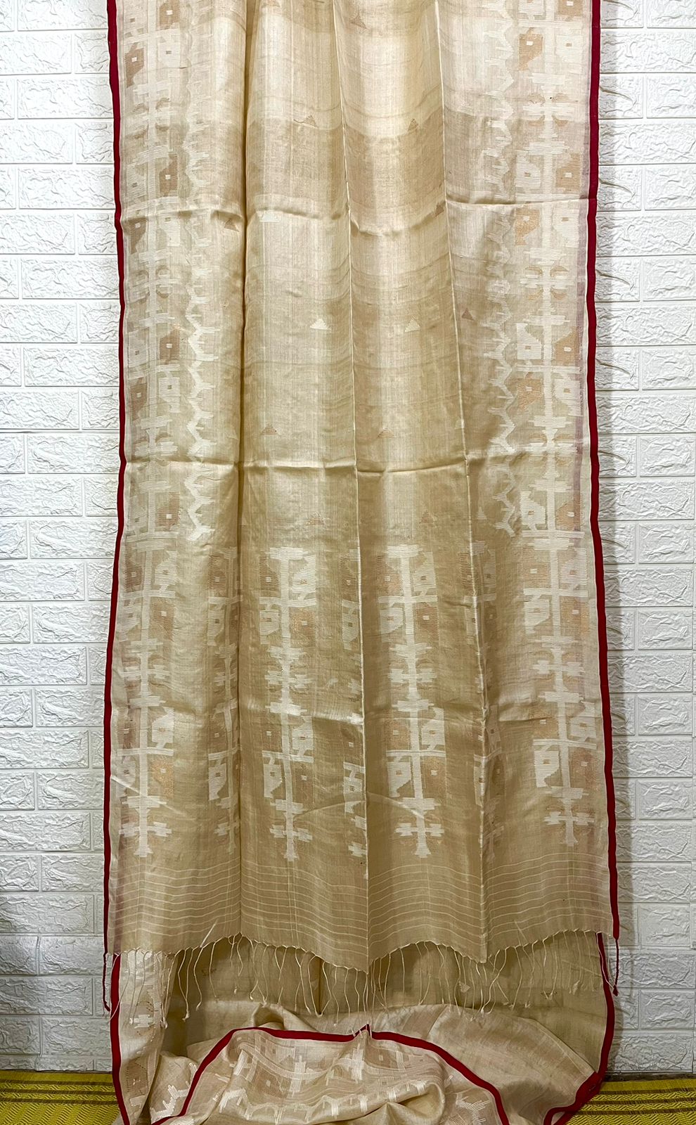 Beige with red border traditional handwoven jamdani saree in tusser silk