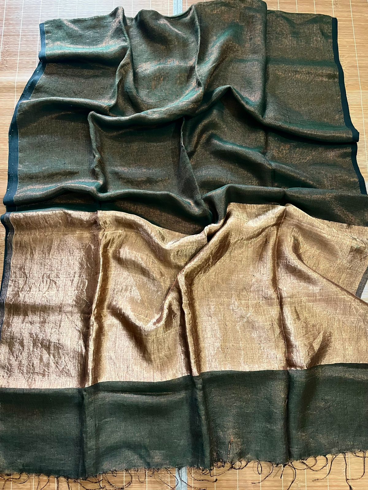 Bottle green zari linen handloom jamdani saree