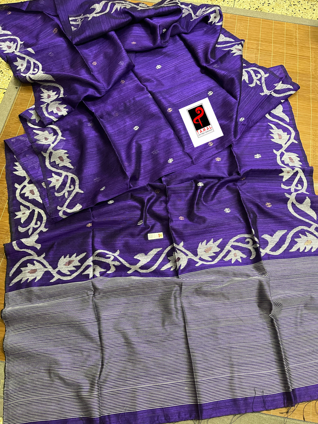 Deep purple with white alpona design handwoven matka silk jamdani saree