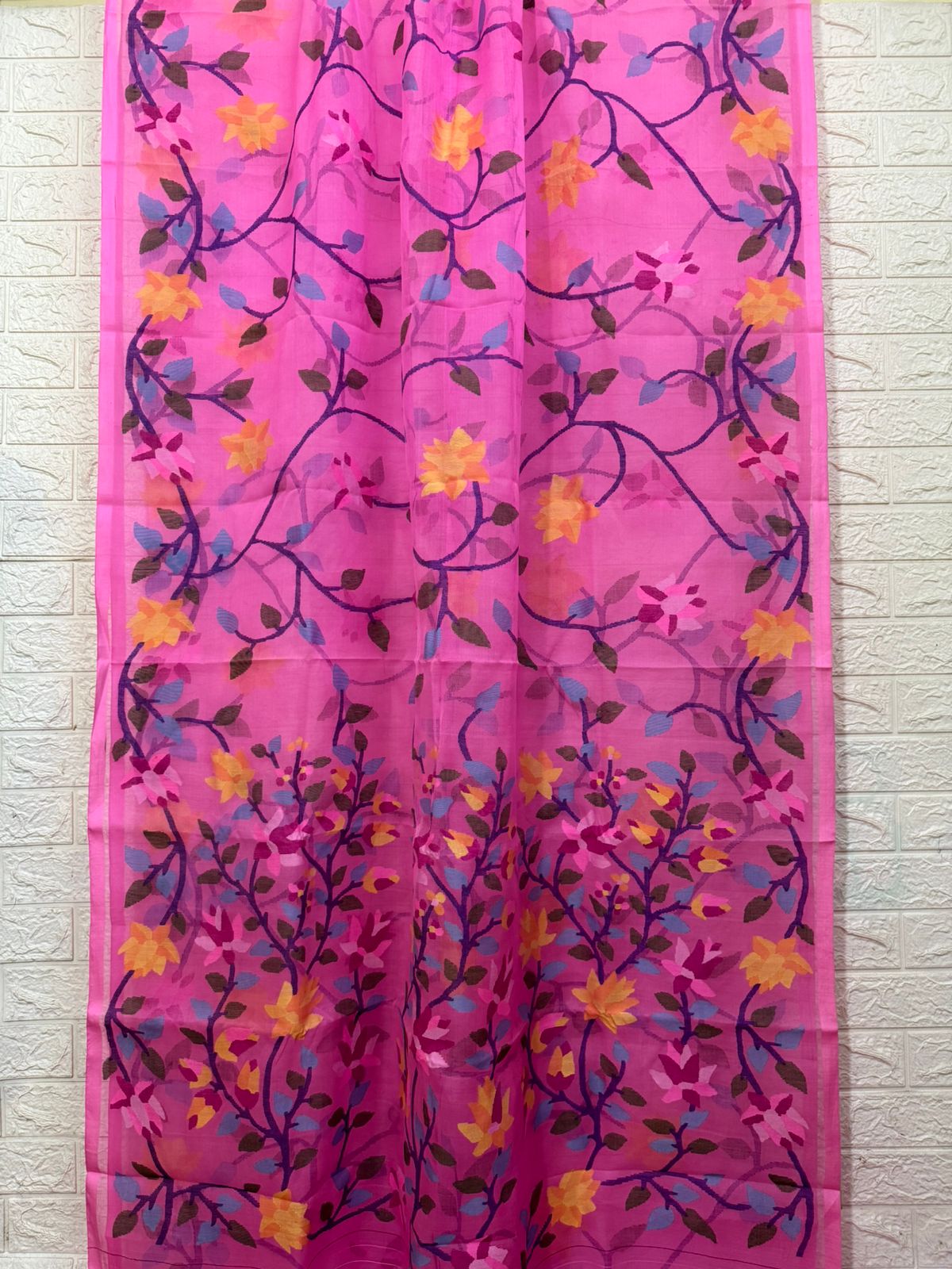 Fuchsia pink with multi colour allover floral motifs handwoven muslin silk jamdani saree