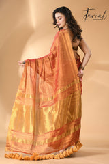 Golden orange tissue handloom saree back