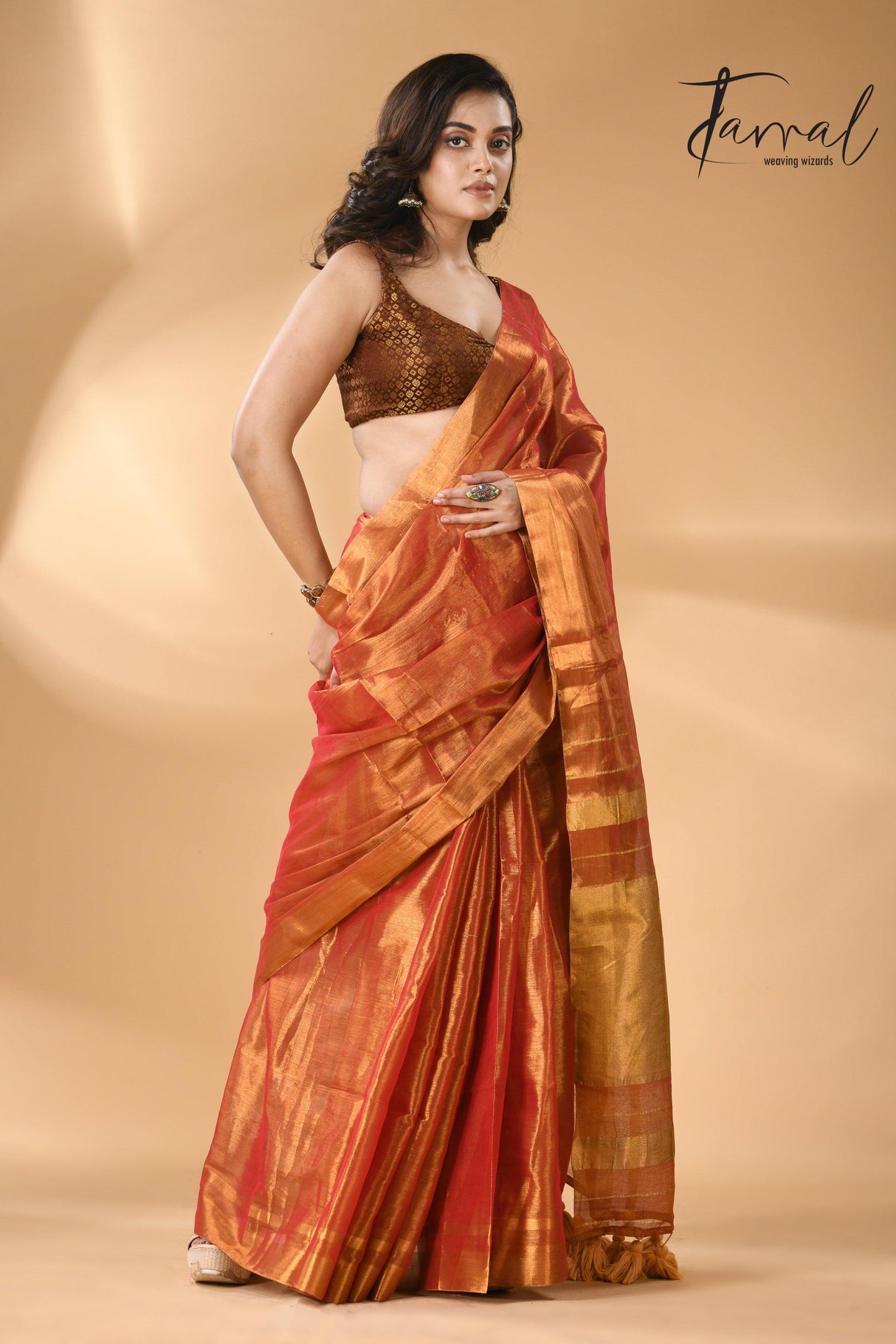 Golden orange tissue handloom saree left