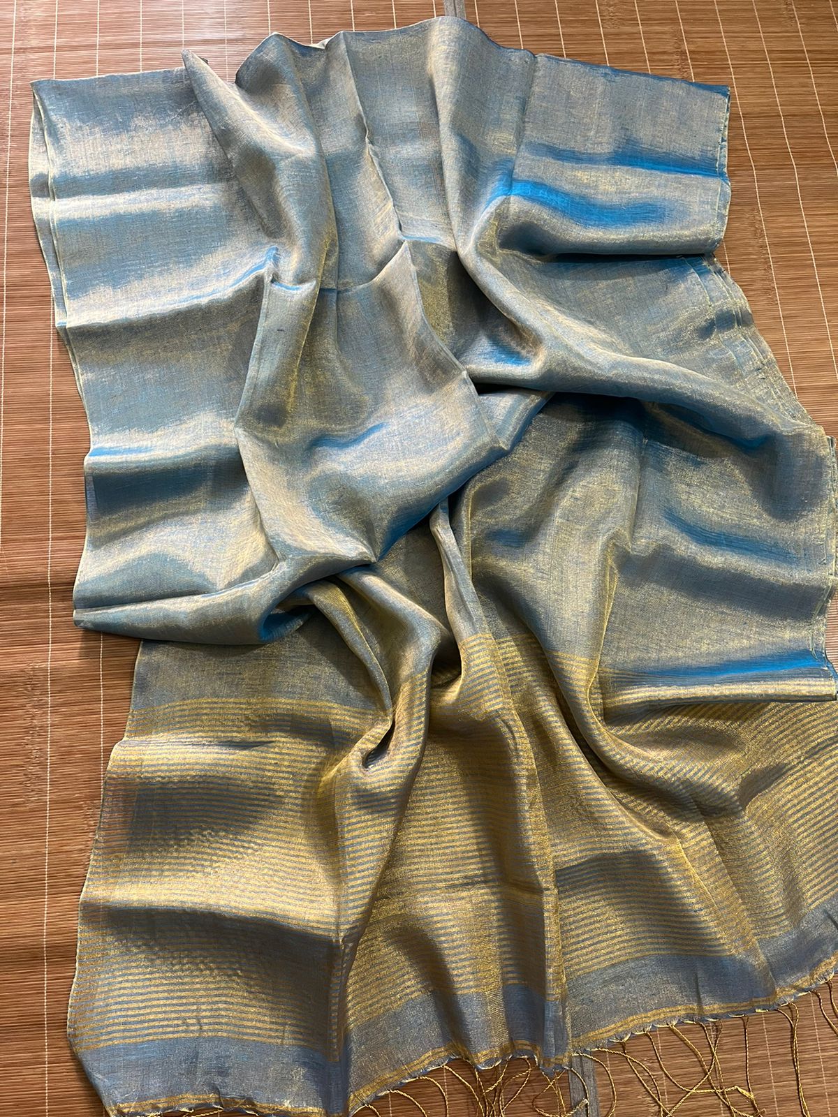 Gold with sky blue dual tone metallic linen handloom saree