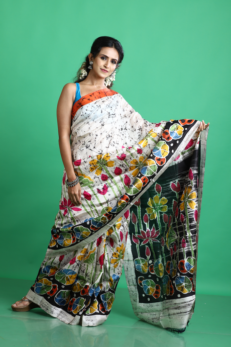 Offwhite with Orange border & multi colour lotus hand batik in katan silk saree - Tamal Boutique