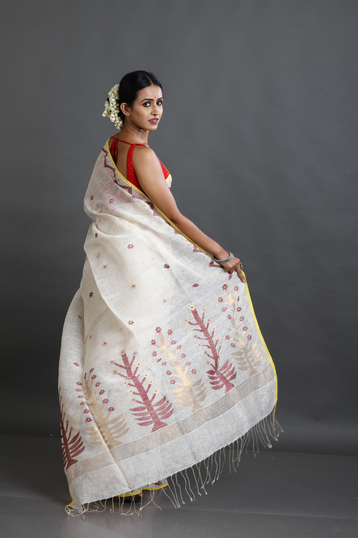 Offwhite with yellow border pure linen handwoven jamdani saree