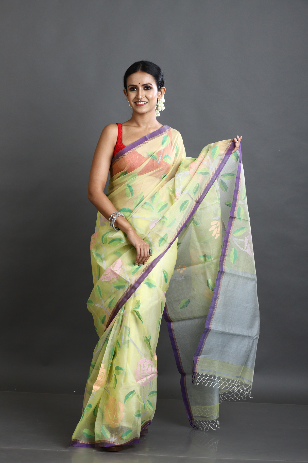 Yellow with purple border allover rose motifs handwoven musli silk jamdani saree