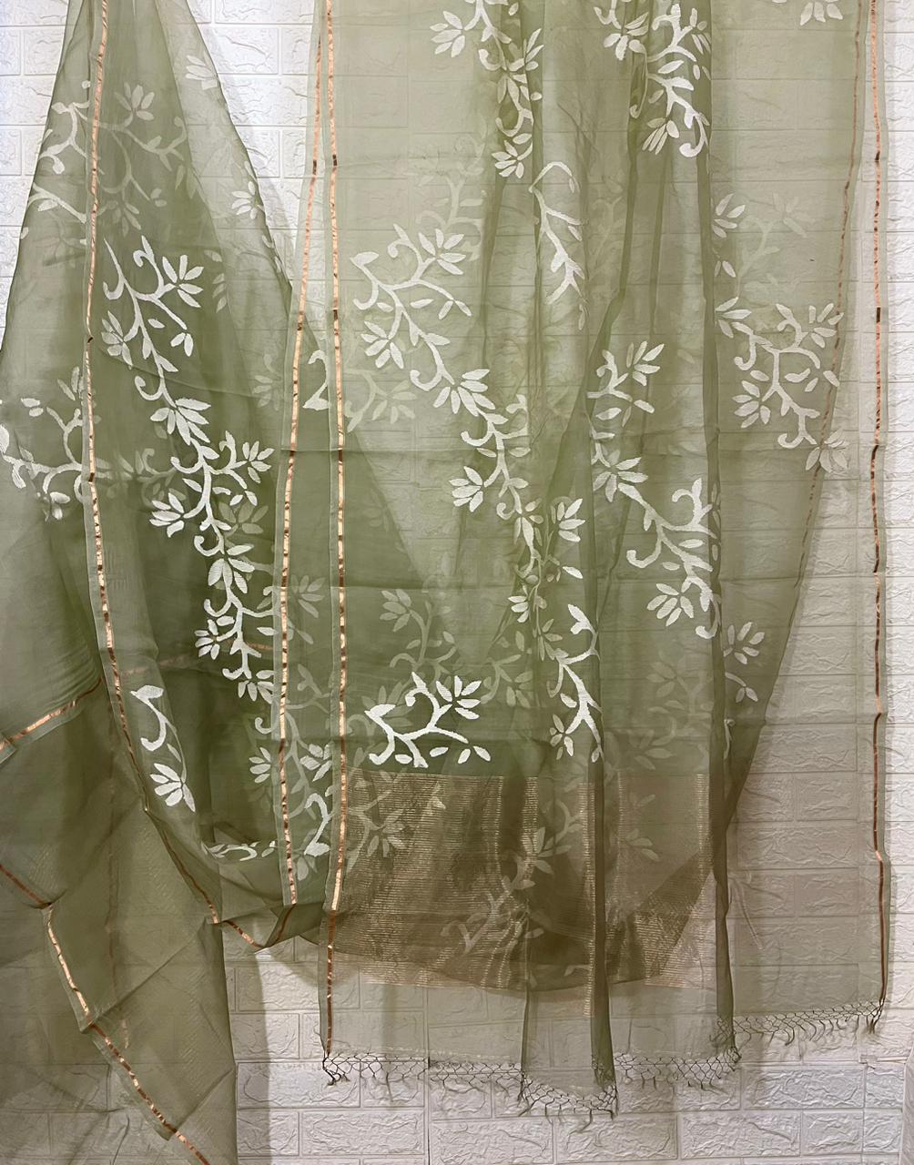 Light mint green with white allover floral handwoven jamdani in muslin silk saree