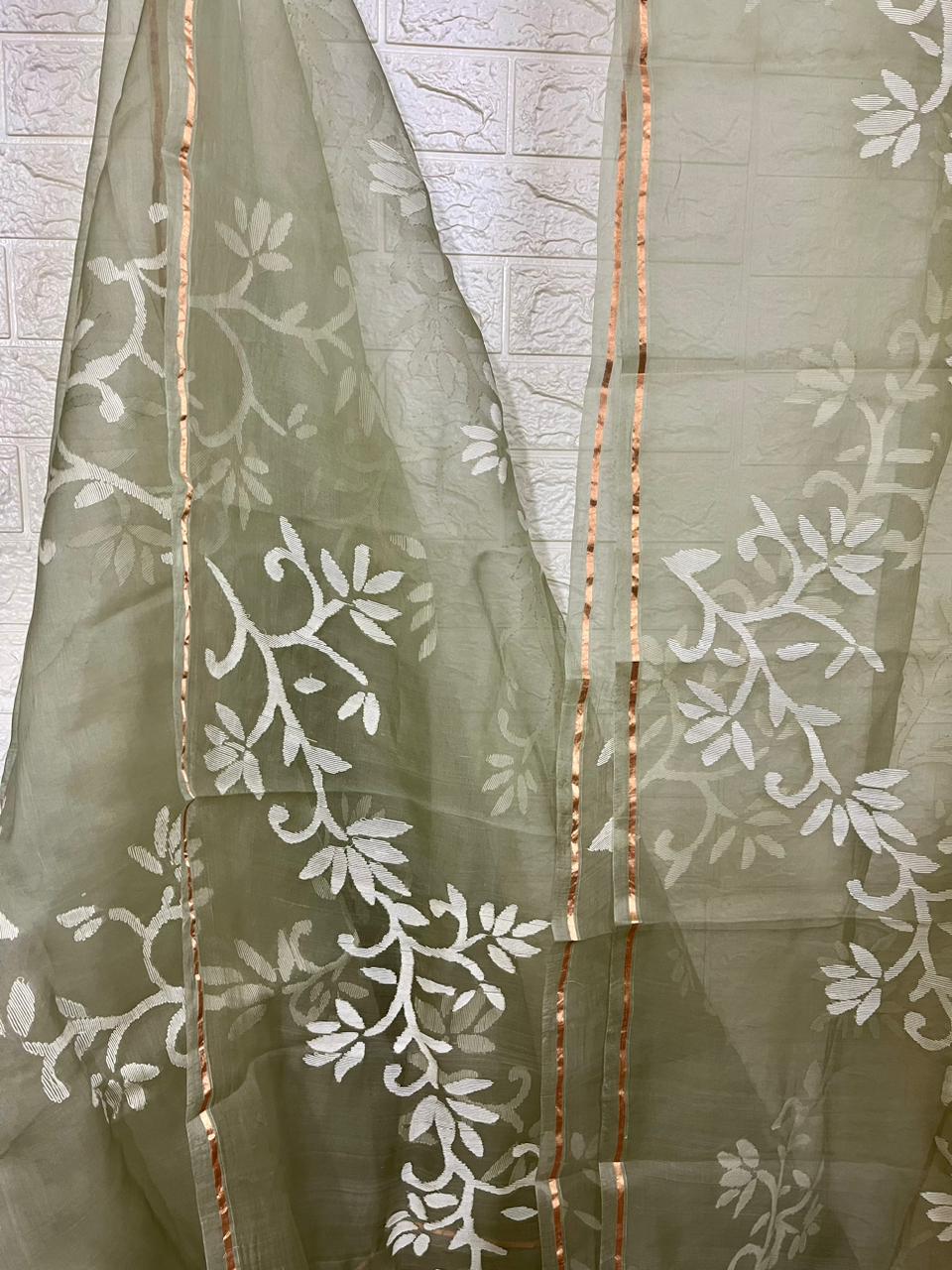 Light mint green with white allover floral handwoven jamdani in muslin silk saree