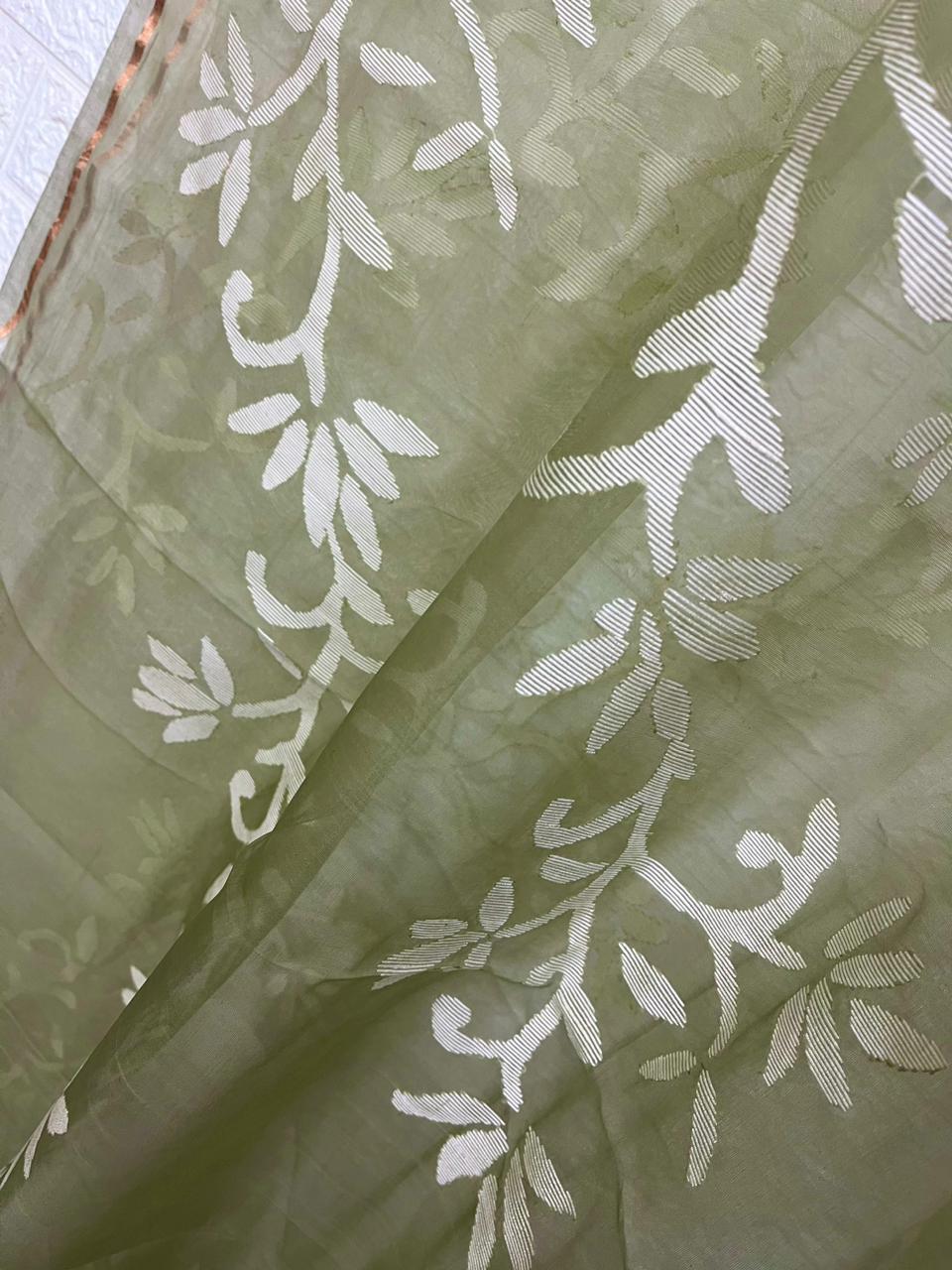 Light mint green with white allover floral handwoven jamdani in muslin silk saree