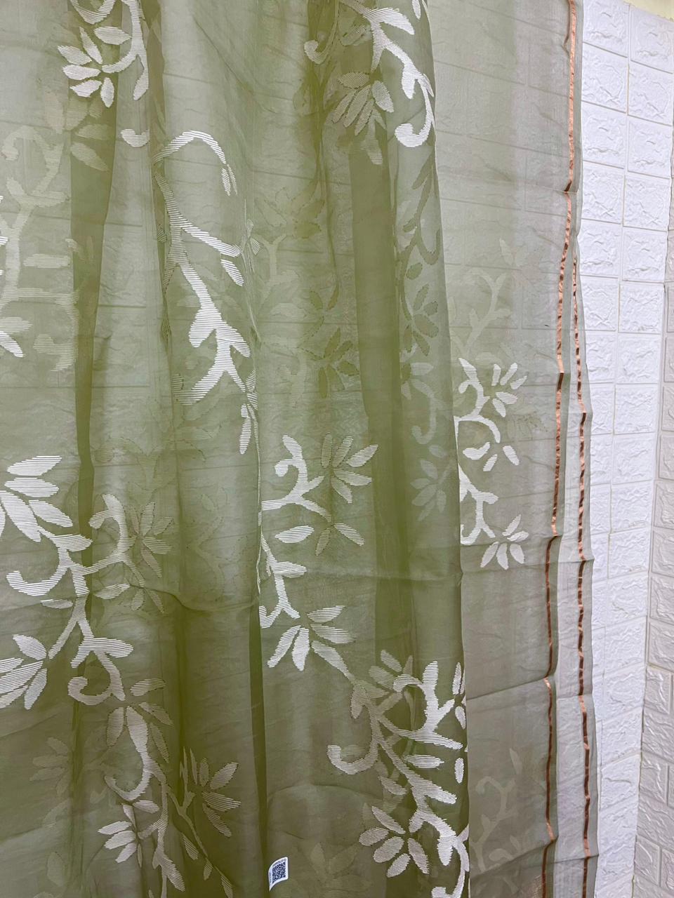 Light mint green with white allover floral handwoven jamdani in muslin silk saree