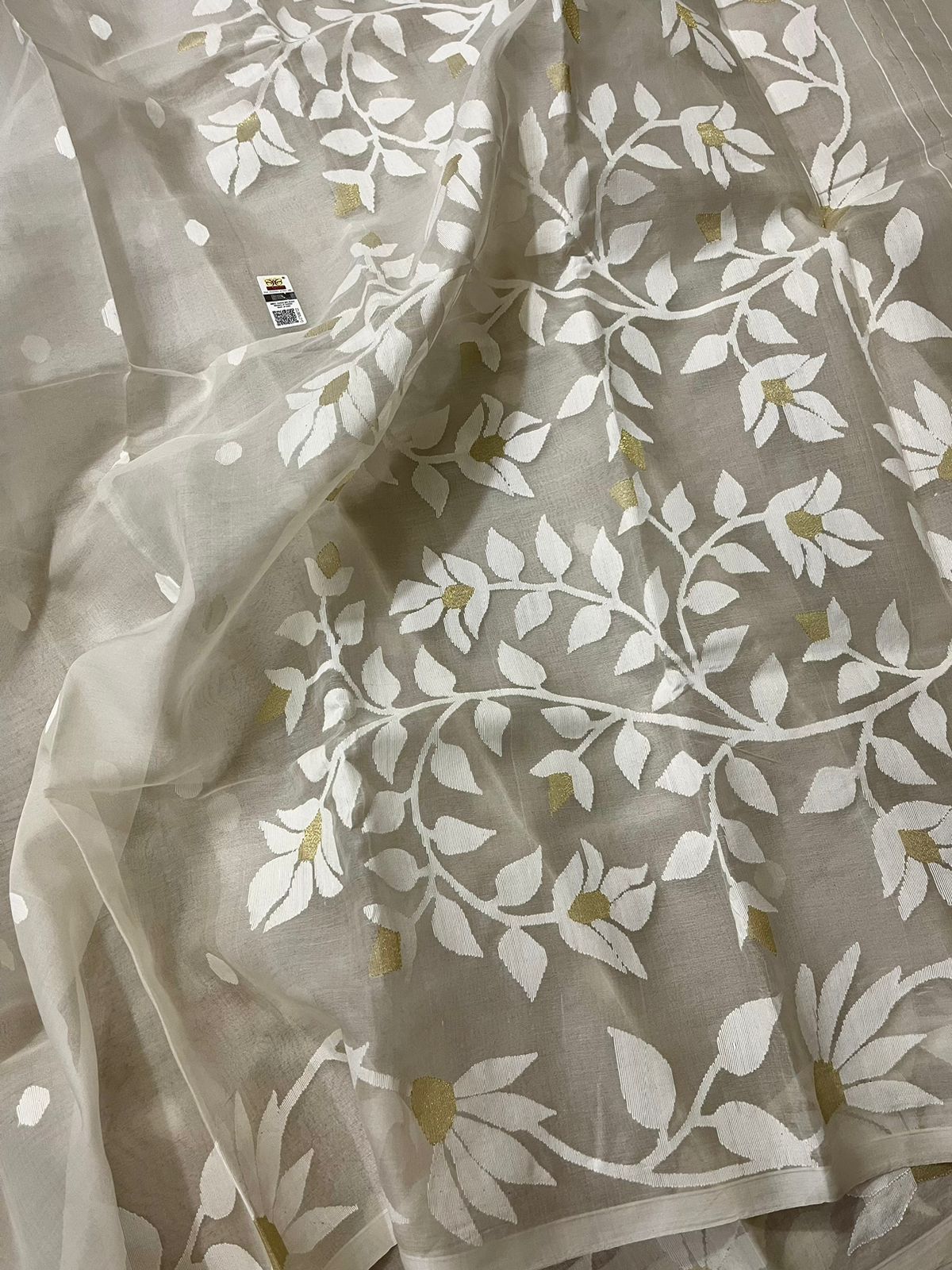 Offwhite self floral handwoven muslin silk jamdani saree