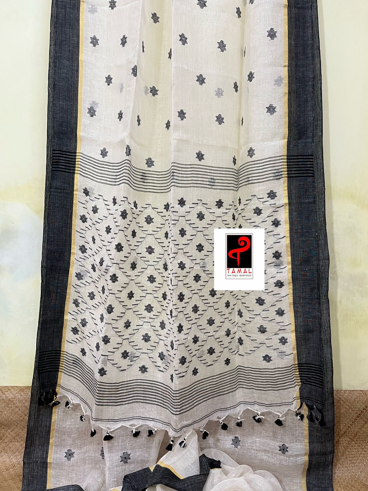 Offwhite with black border linen handwoven jamdani saree