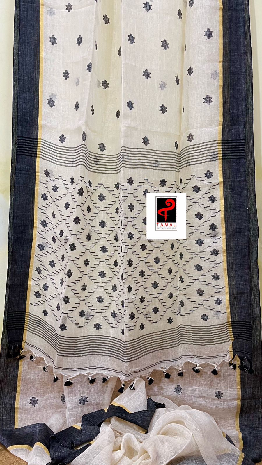 Offwhite with black border linen handwoven jamdani saree