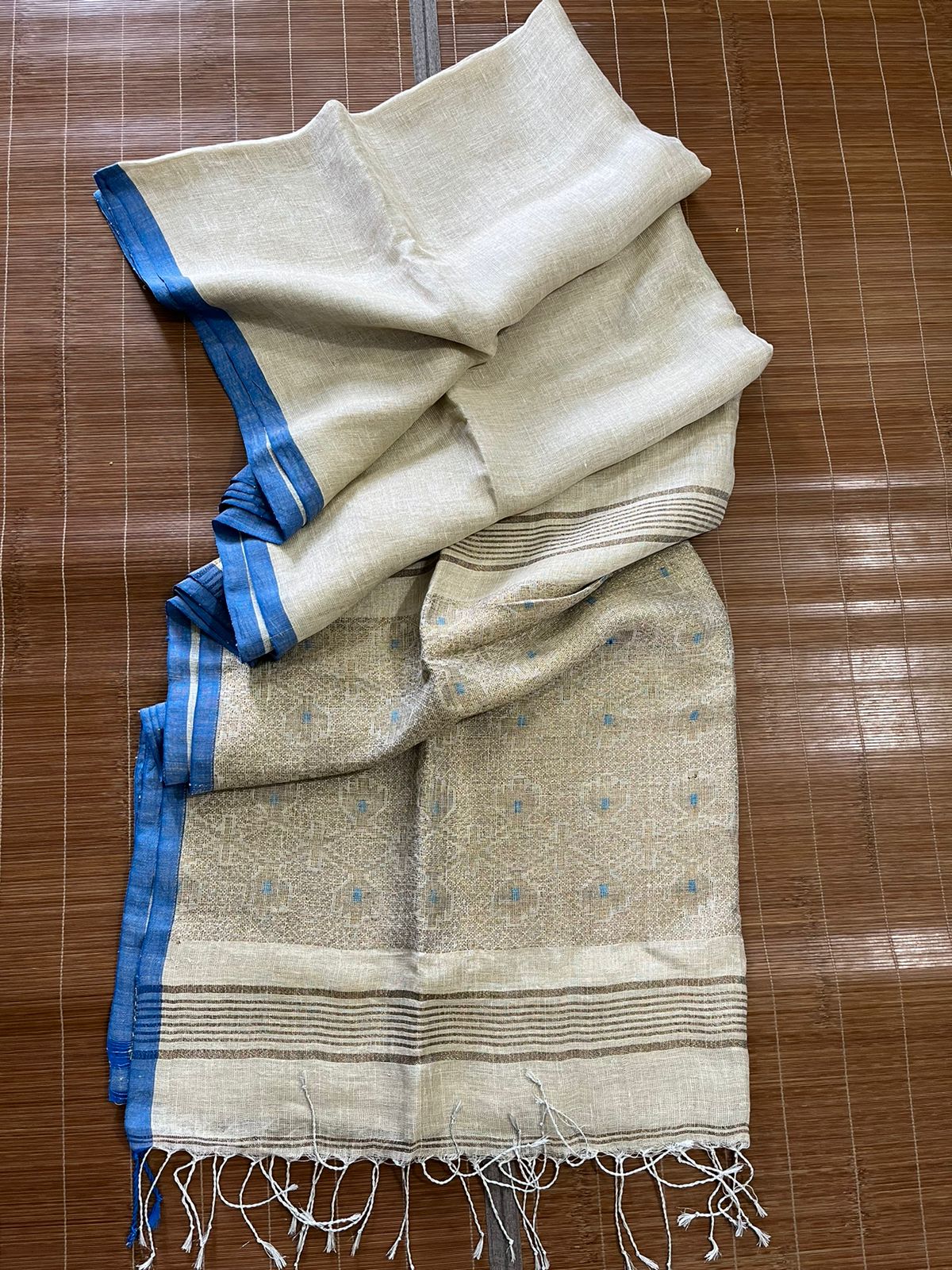 Offwhite with blue border tissue linen handloom jamdani saree