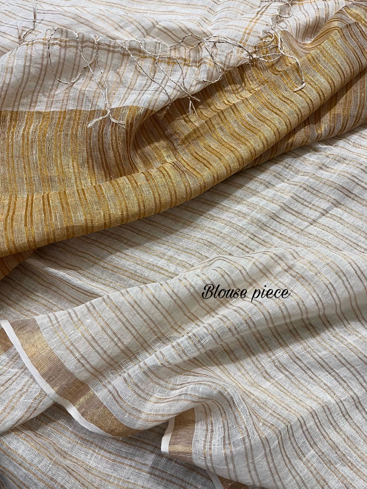 Offwhite with golden strip pure linen handloom saree