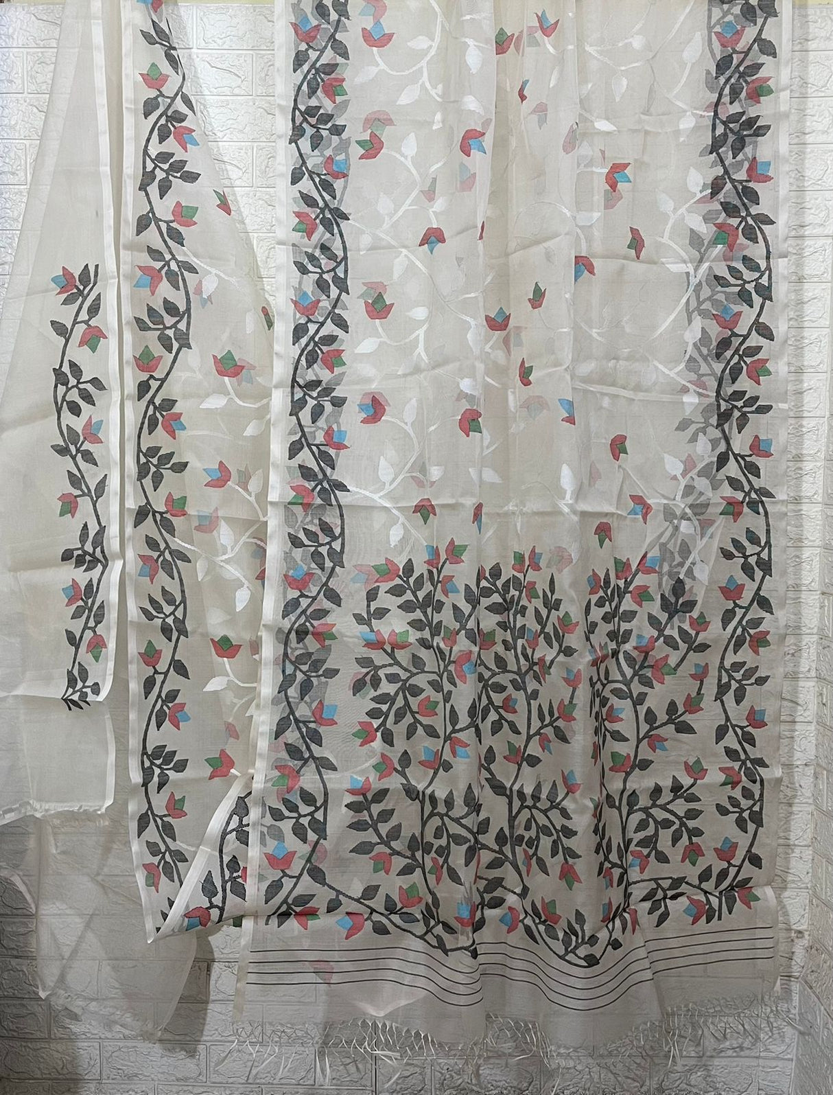 Offwhite with multi colour allover floral muslin silk handwoven jamdani saree