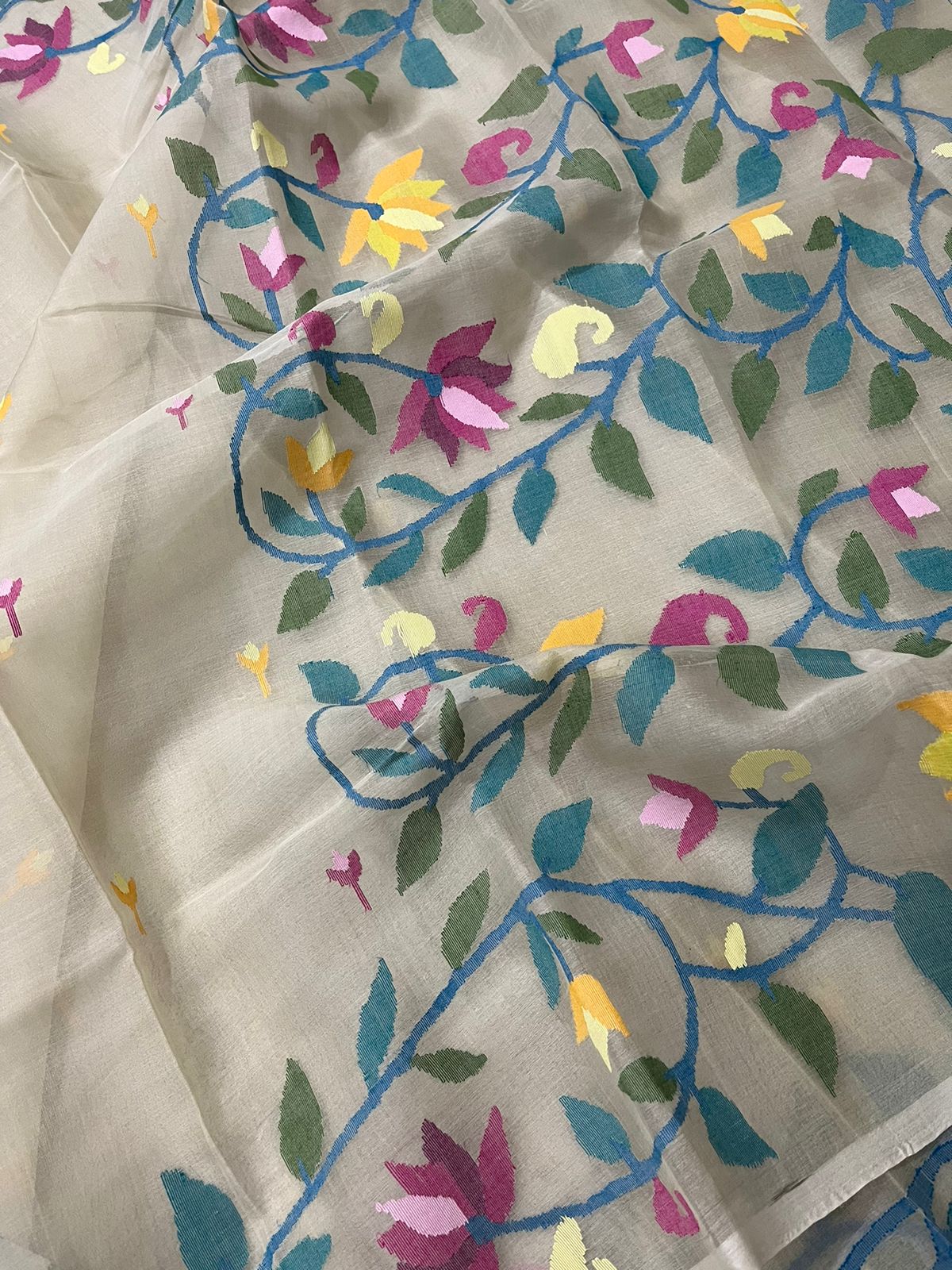 Offwhite with multi colour lotus pallu handwoven muslin silk jamdani saree