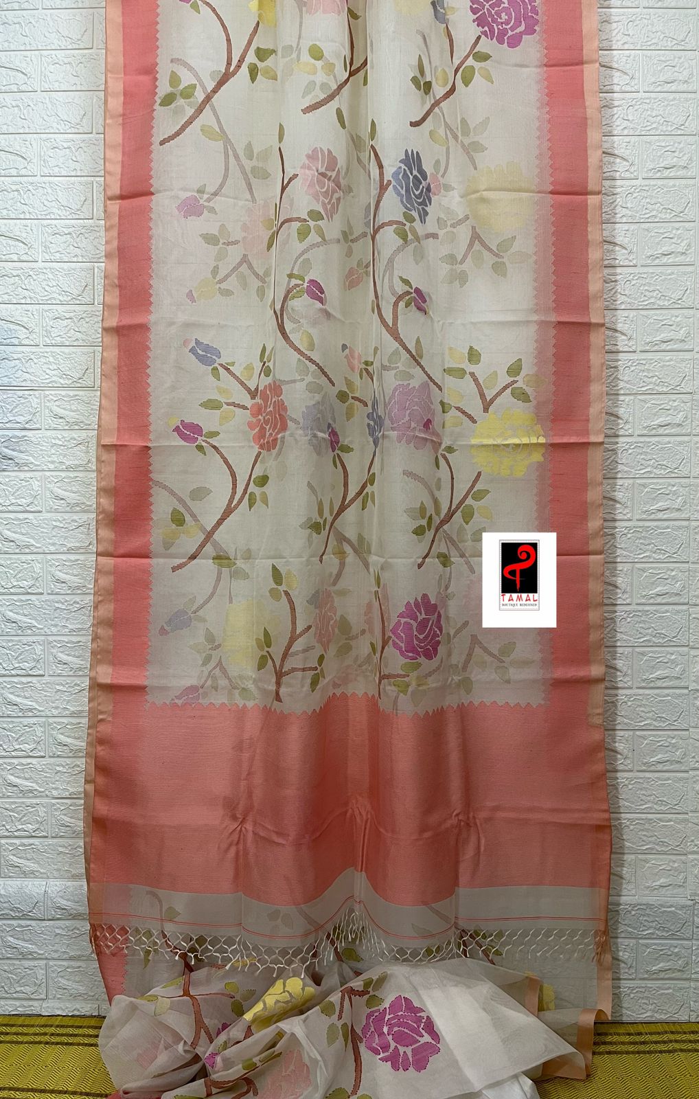 Offwhite with peach temple border allover rose motifs handwoven jamdani saree