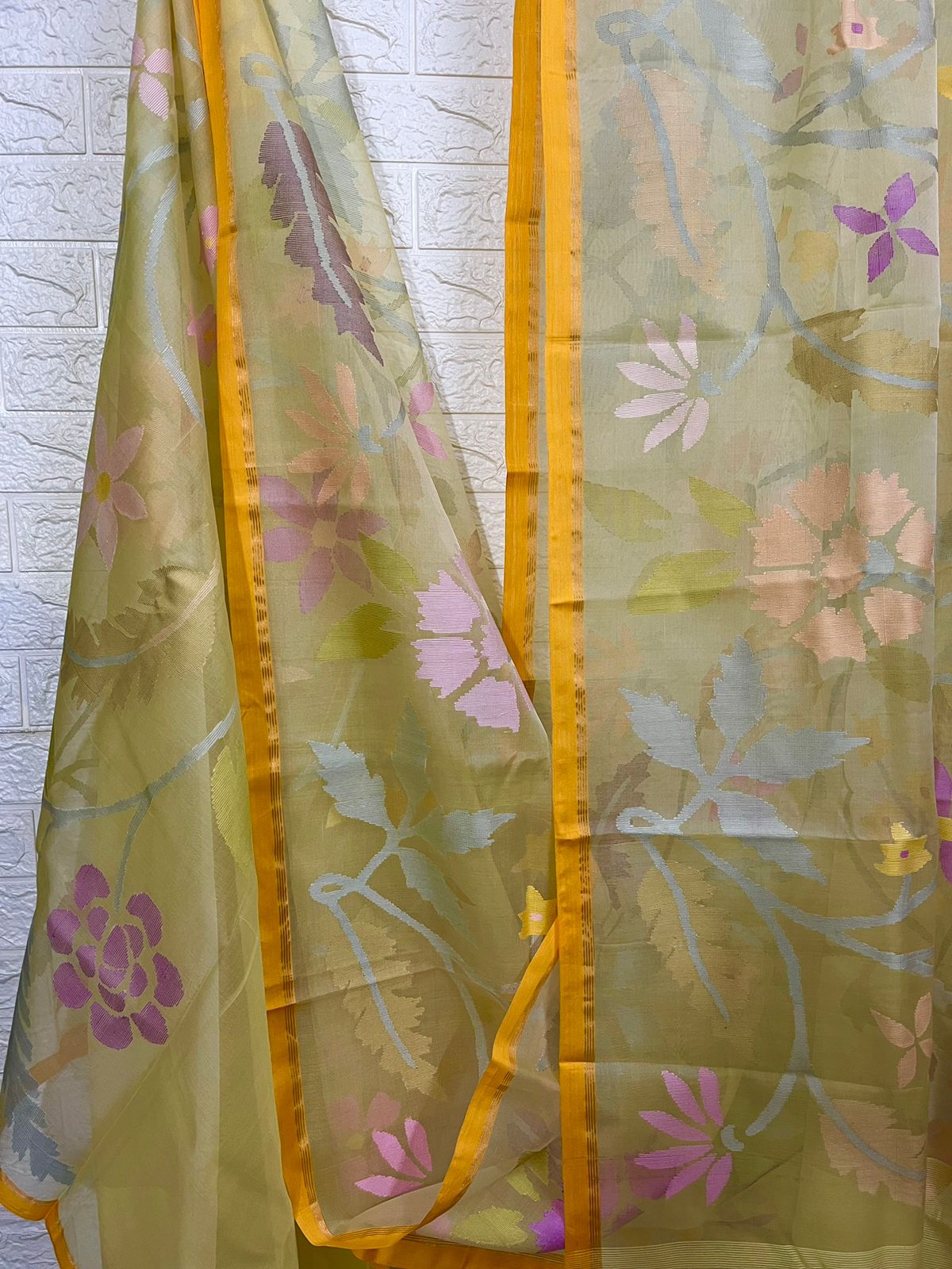 Pale yellow with multi colour muslin silk allover floral handwoven jamdani saree