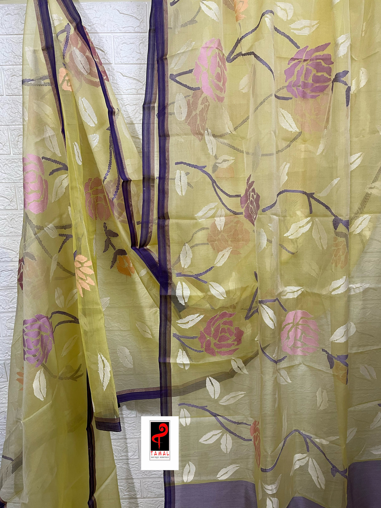 Pale yellow with purple border allover rose motifs handwoven musli silk jamdani saree