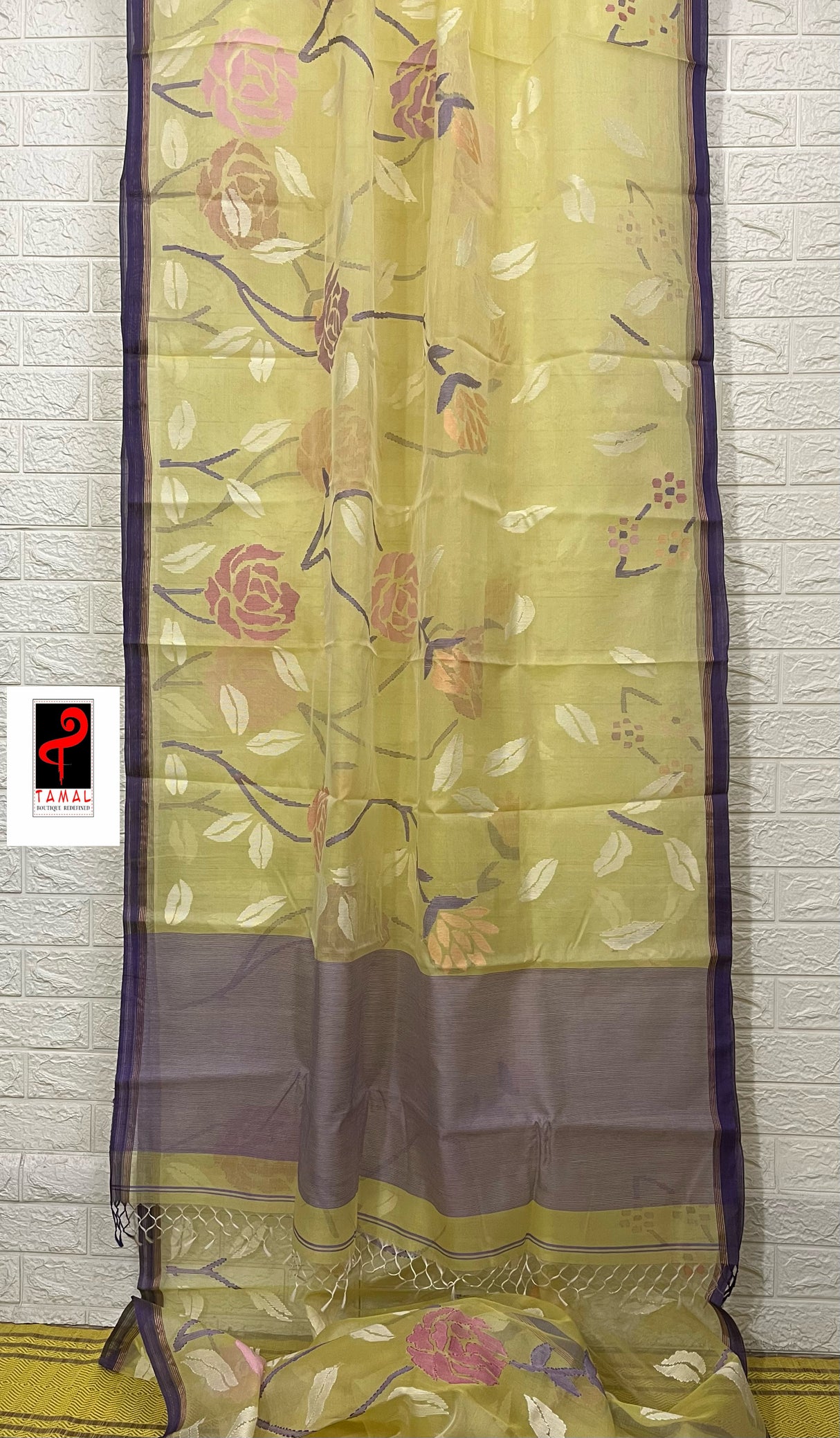 Pale yellow with purple border allover rose motifs handwoven musli silk jamdani saree