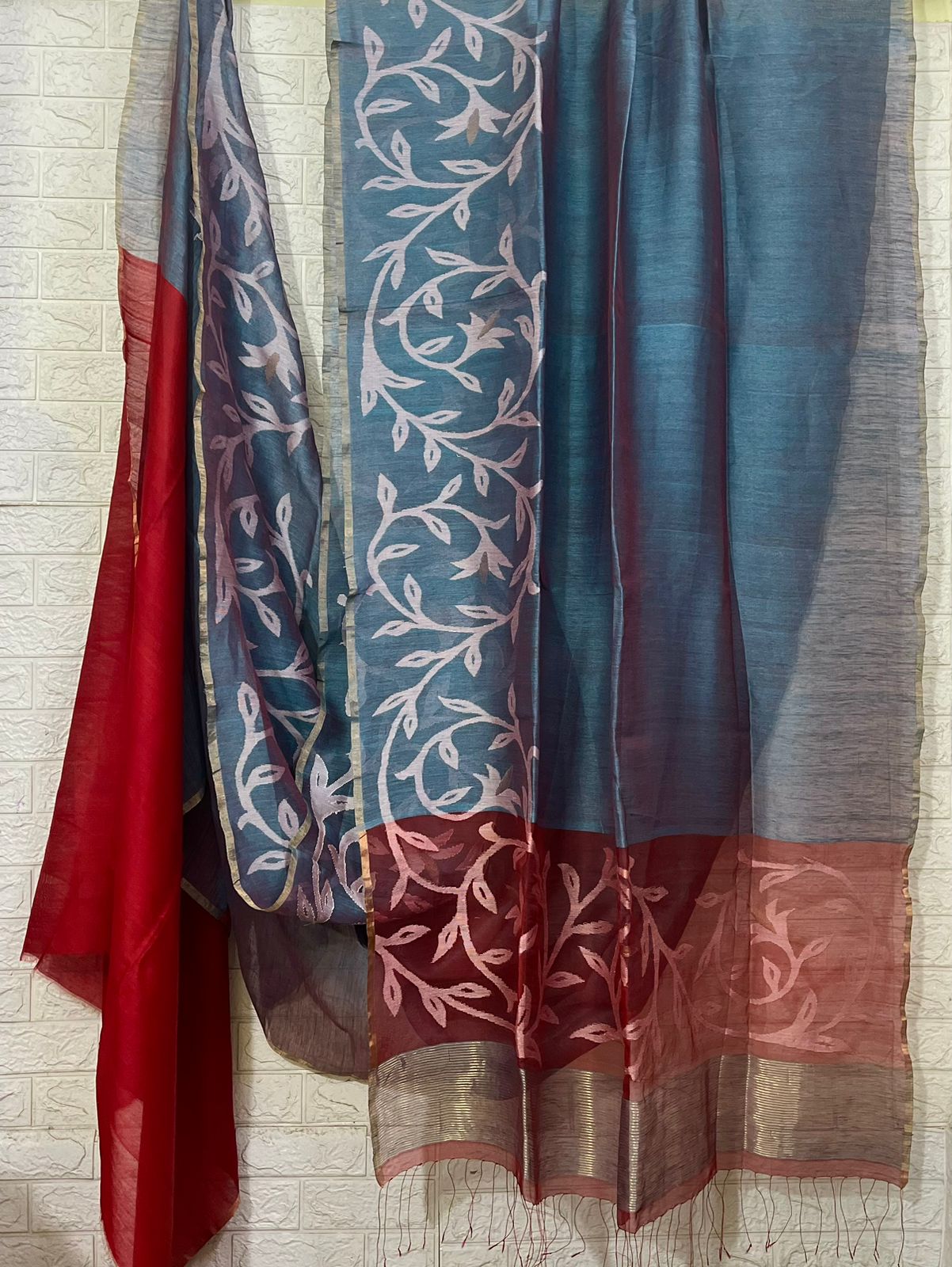 Peacock blue with red pallu border floral handwoven jamdani saree