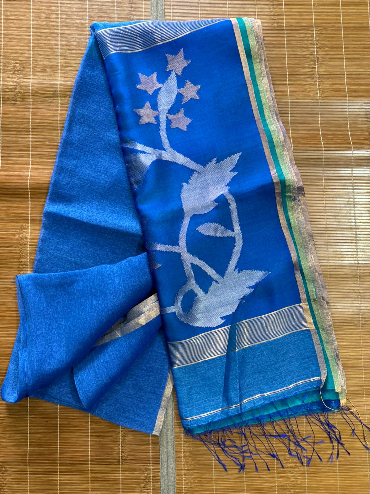 Peacock blue with zari border and silver pallu silk linen handwoven jamdani saree