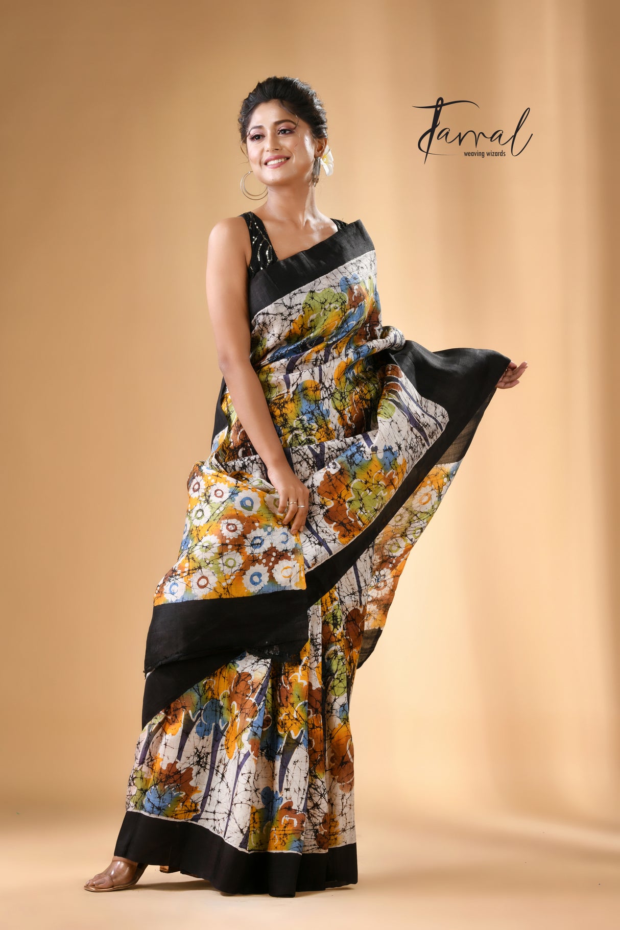 Offwhite with black border jangal hand batik in katan silk saree