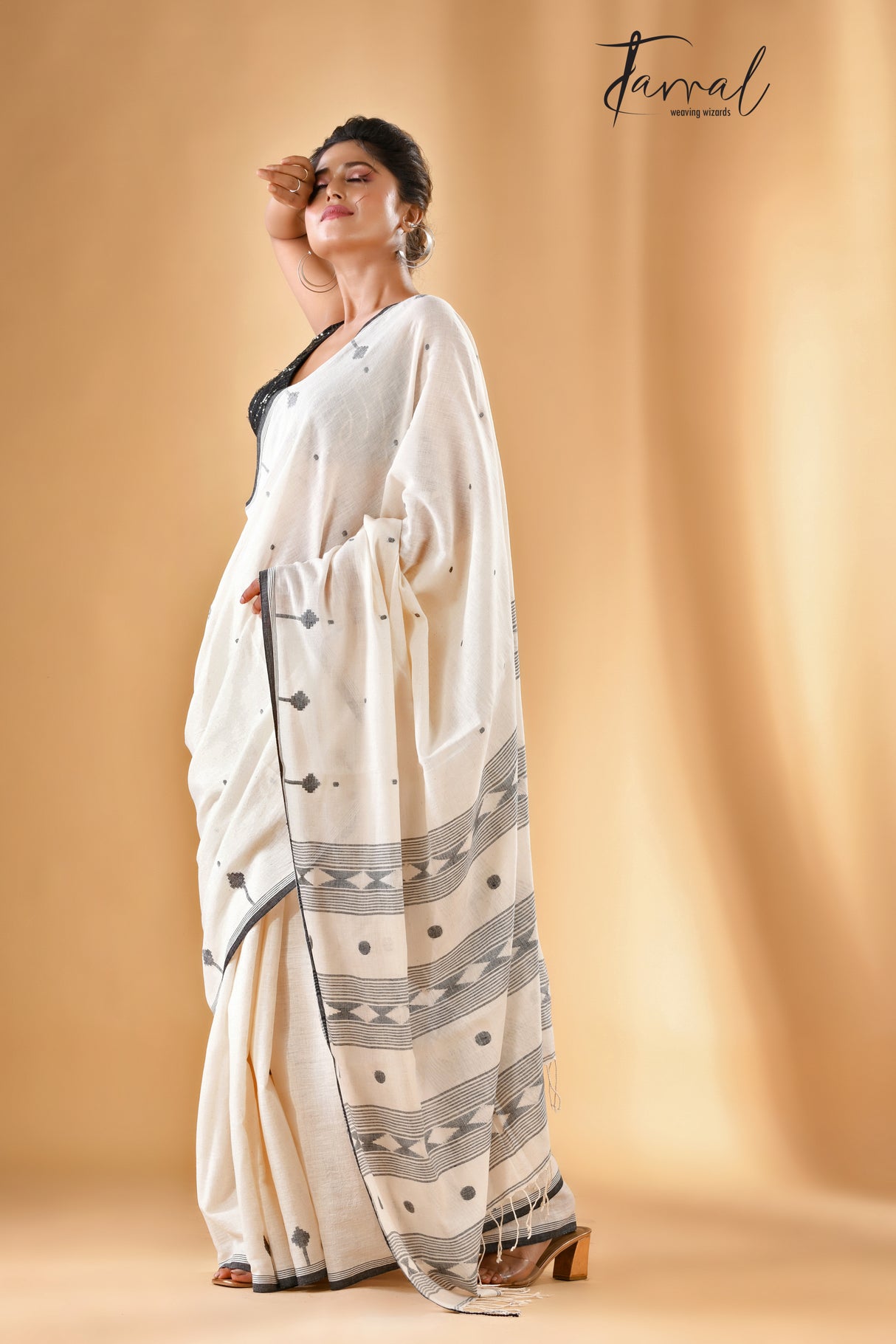 Offwhite with black border cotton handwoven jamdani saree