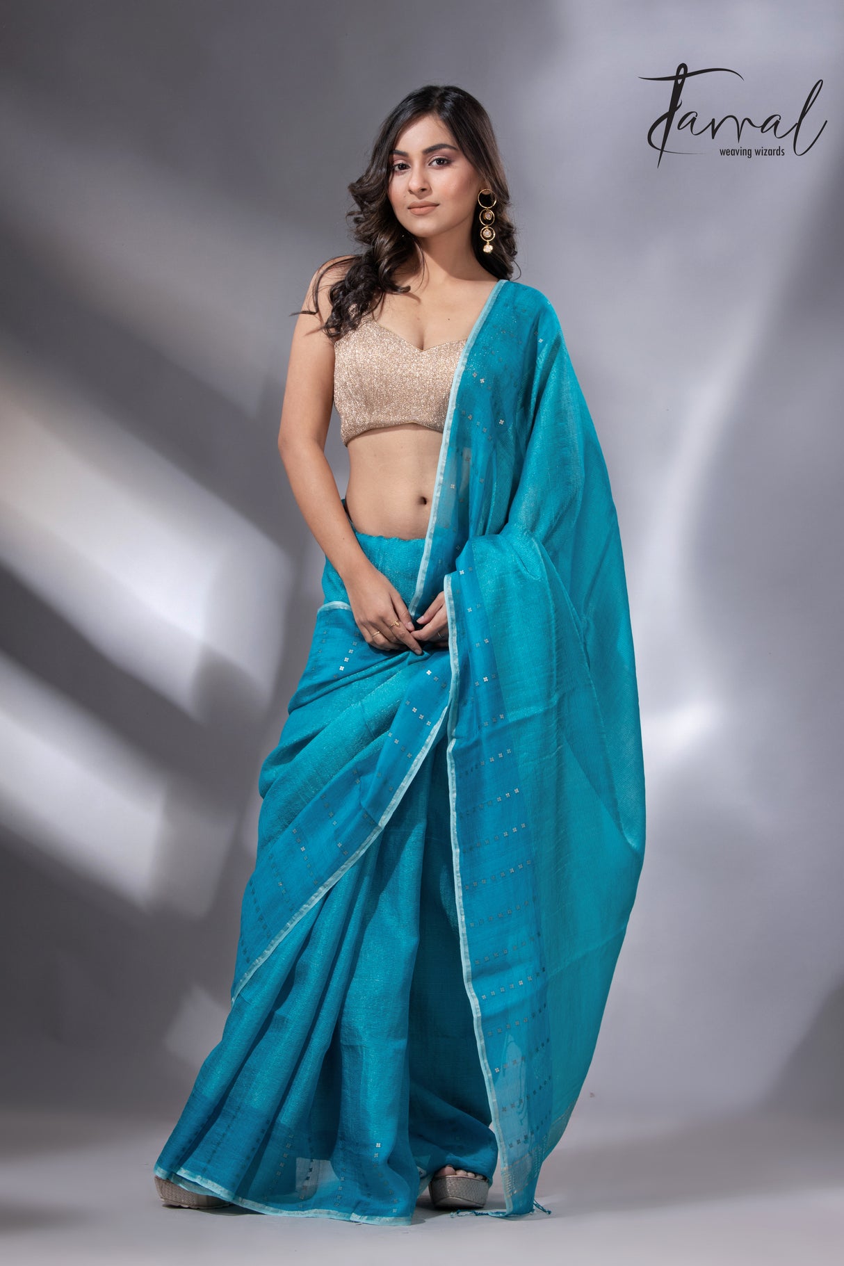 Peacock blue sequins border noil tusser zari silk handloom saree