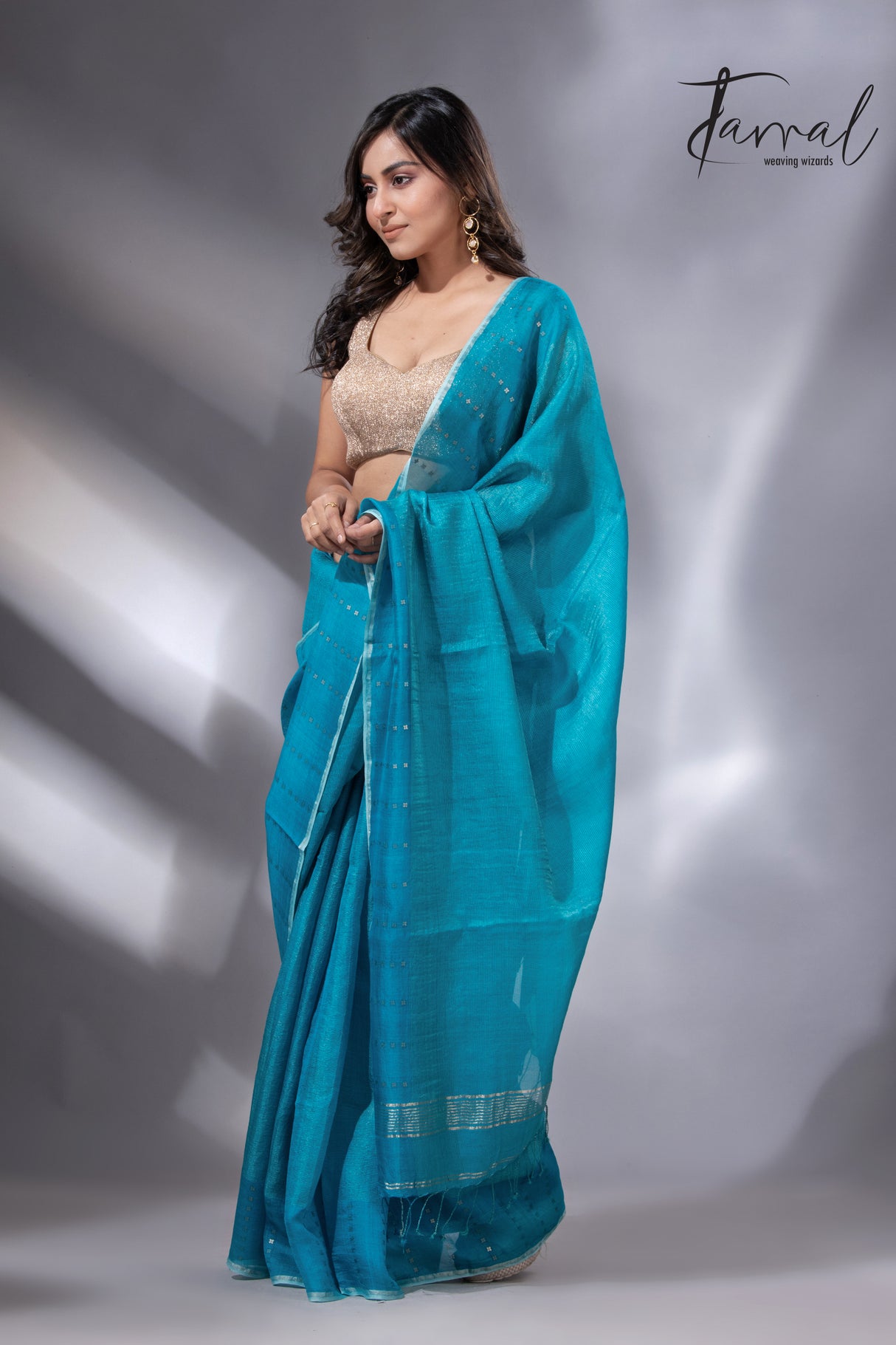 Peacock blue sequins border noil tusser zari silk handloom saree