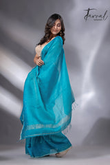 Peacock blue sequins border noil tusser zari silk handloom saree