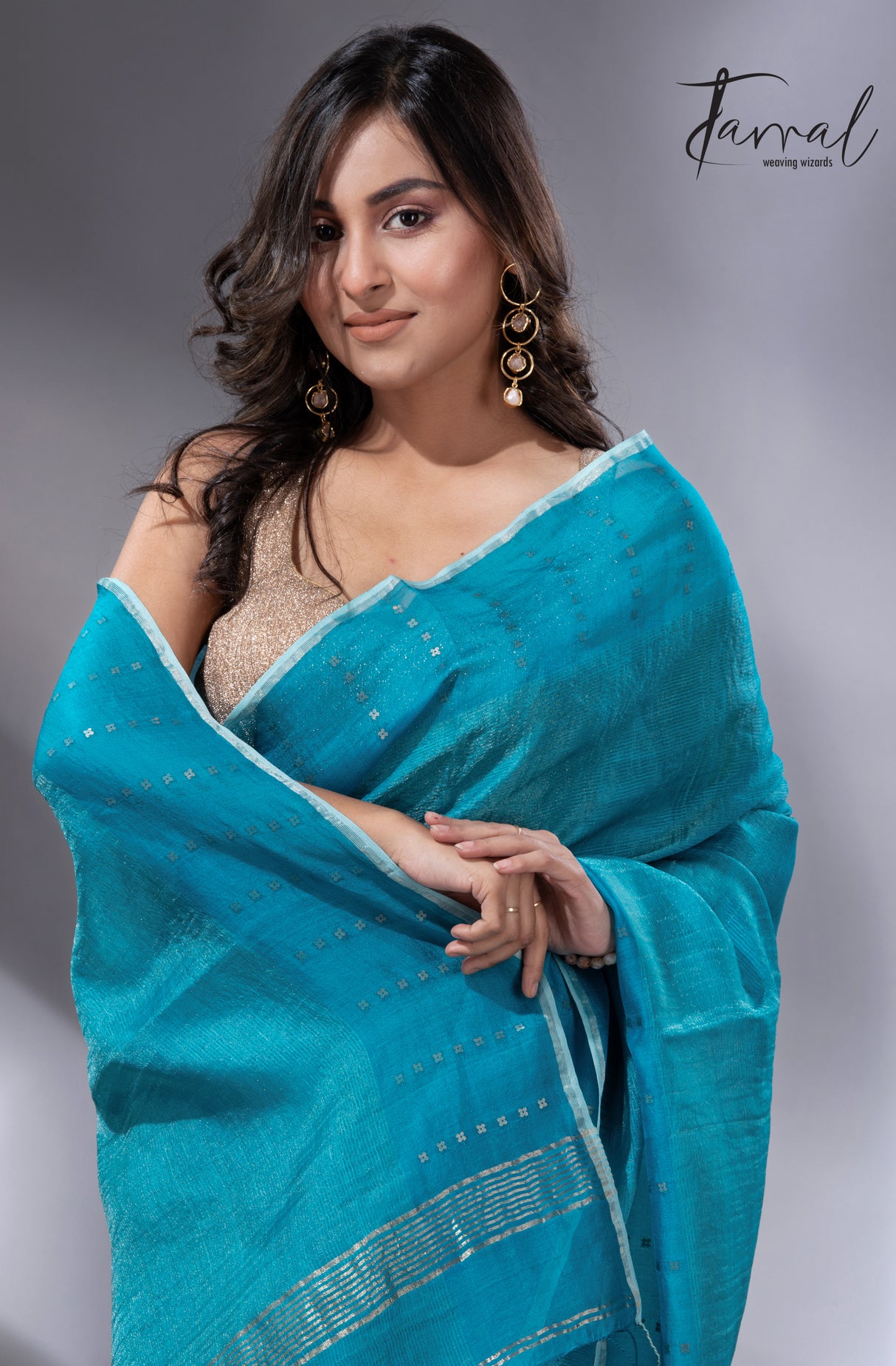 Peacock blue sequins border noil tusser zari silk handloom saree