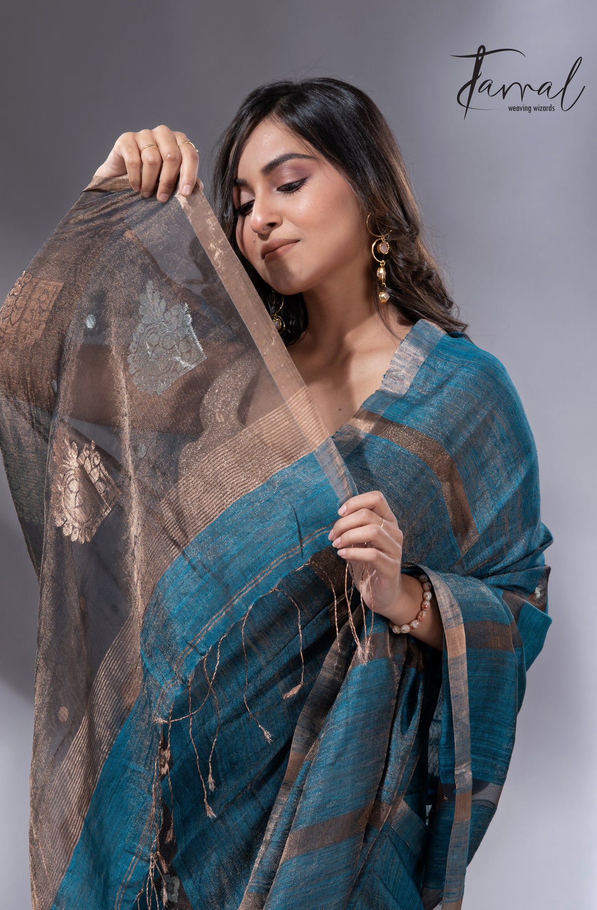 Peacock blue elegancewith black pallu tissue matka handloom jamdani saree