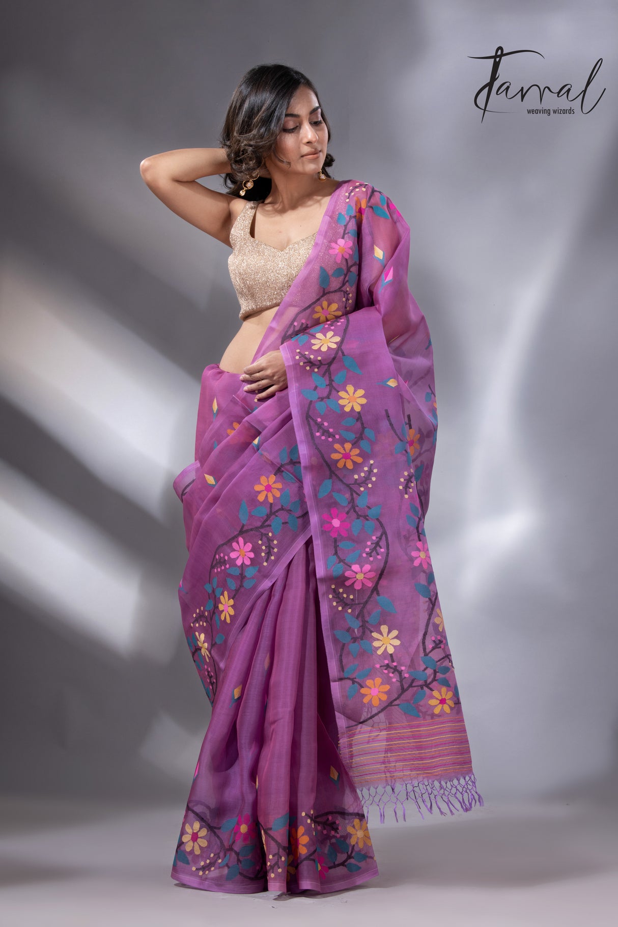 Purple with multi colour floral border handwoven muslin jamdani saree