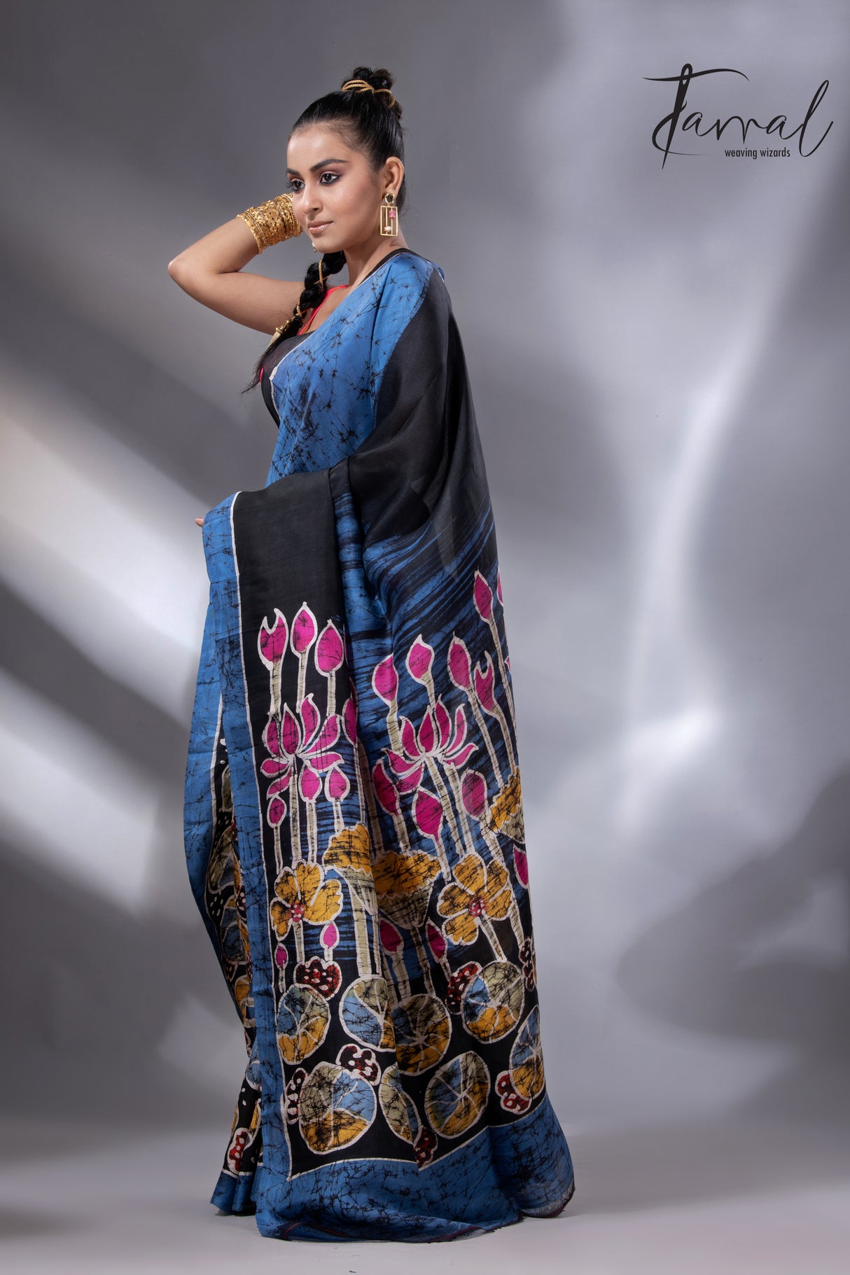 Blue with multi colour lotus hand batik silk saree