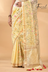 Cream with zari border silk linen embroidered handloom saree