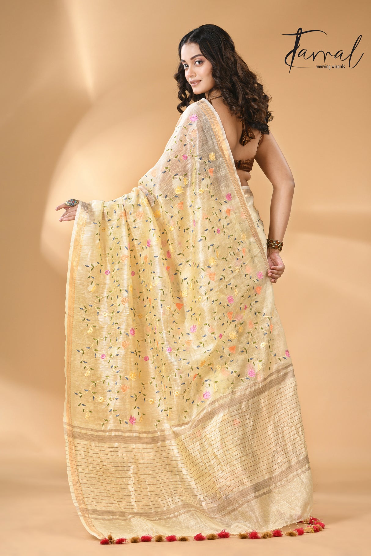 Cream with zari border silk linen embroidered handloom saree