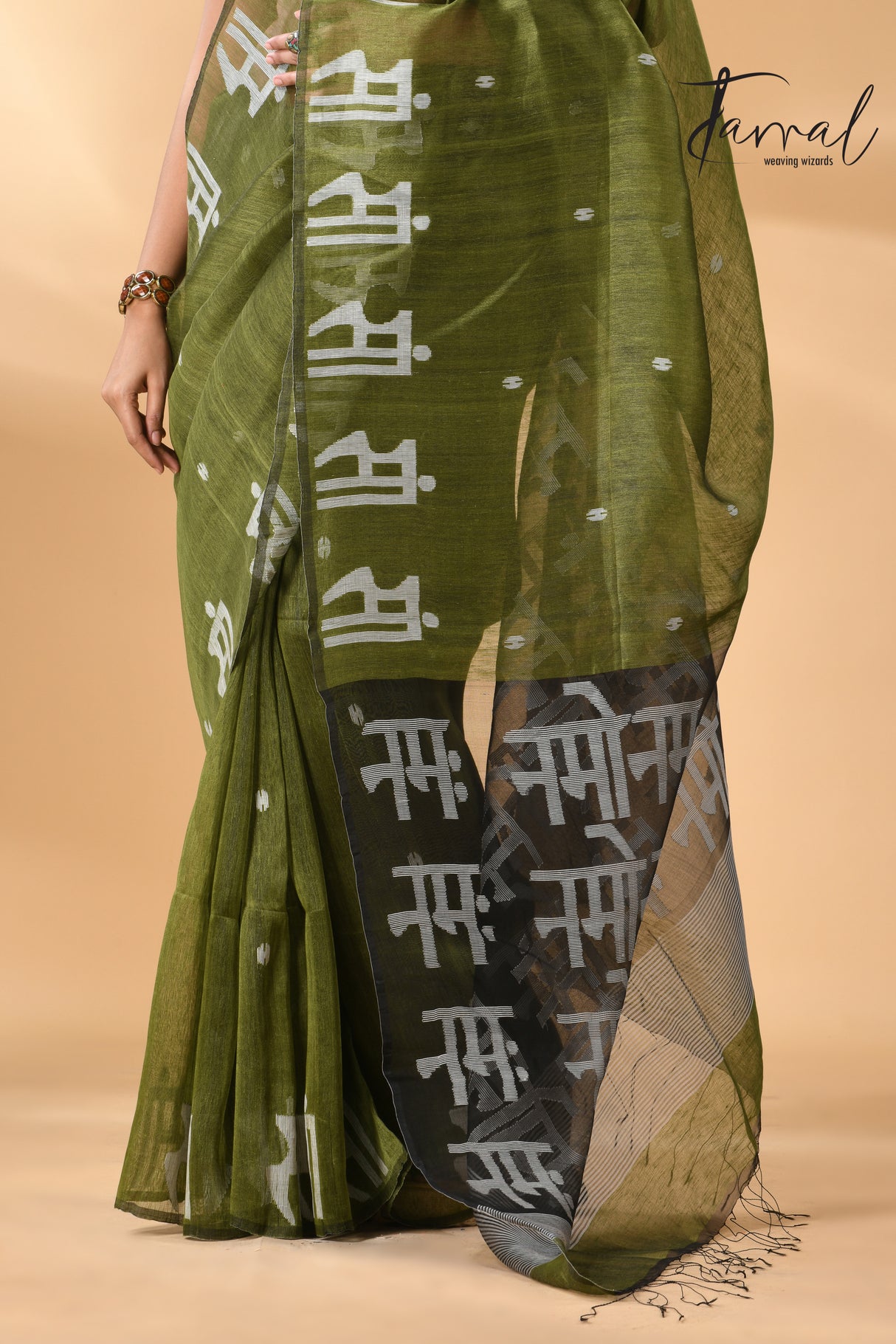 Moss green with black pallu silk linen handwoven jamdani saree