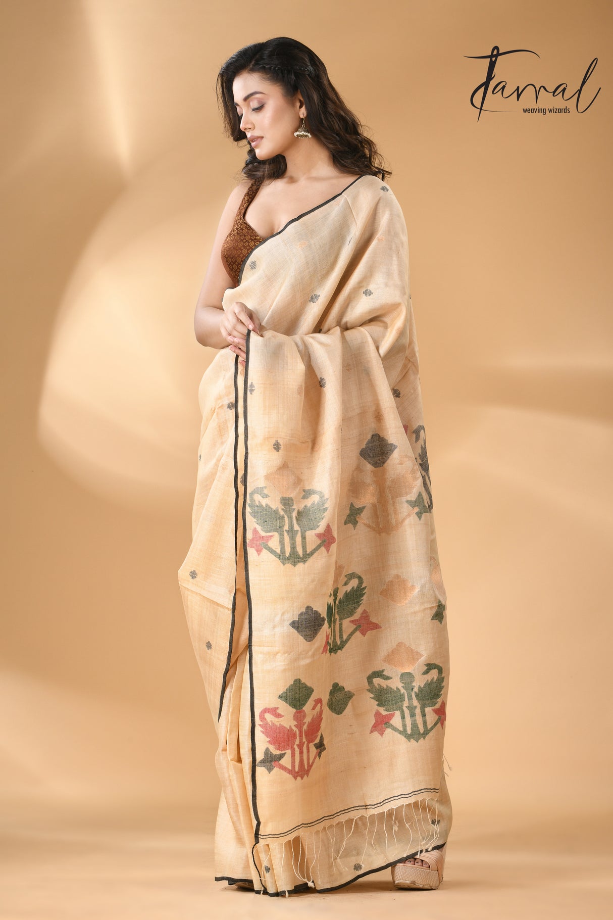 Light beige colour with black border pure tissue neddle work tusser jamdani saree