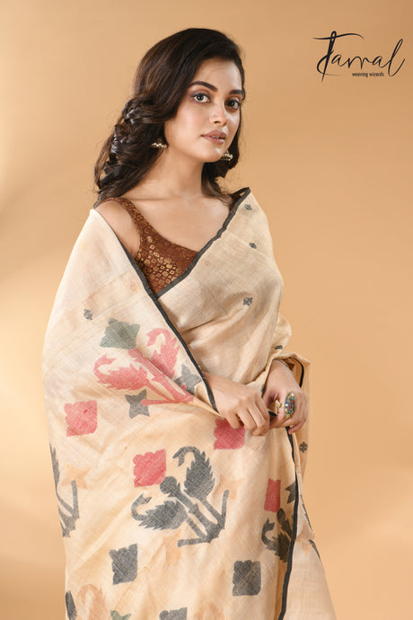 Light beige colour with black border pure tissue neddle work tusser jamdani saree