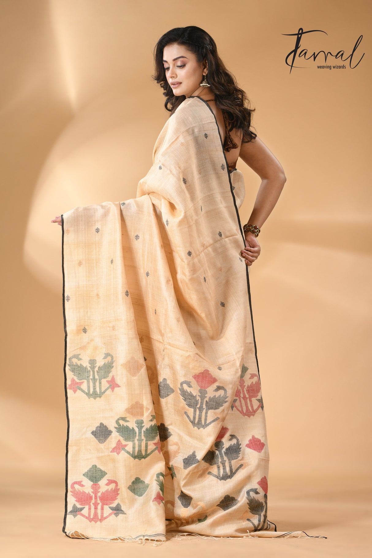 Light beige colour with black border pure tissue neddle work tusser jamdani saree