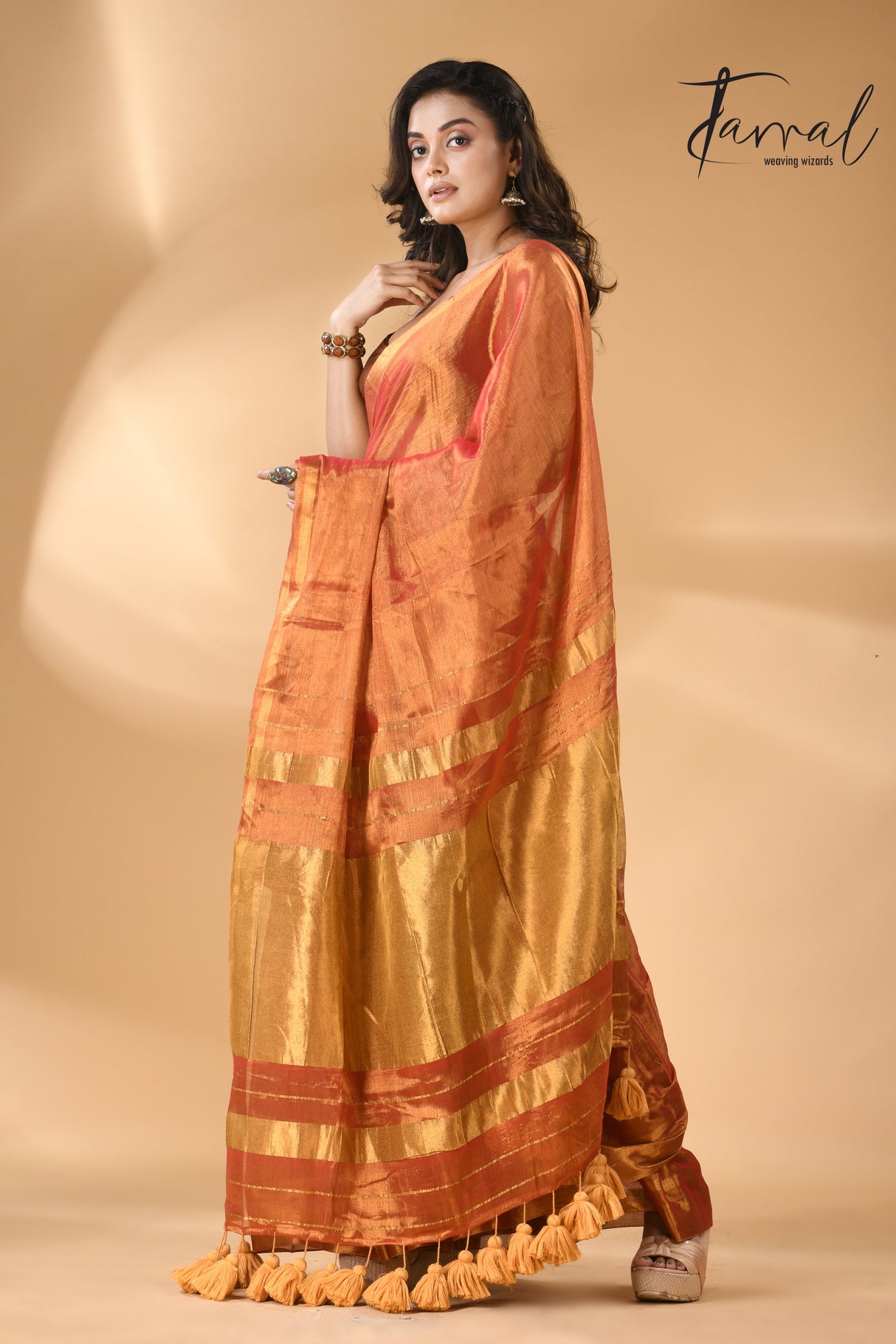 Golden orange tissue handloom saree