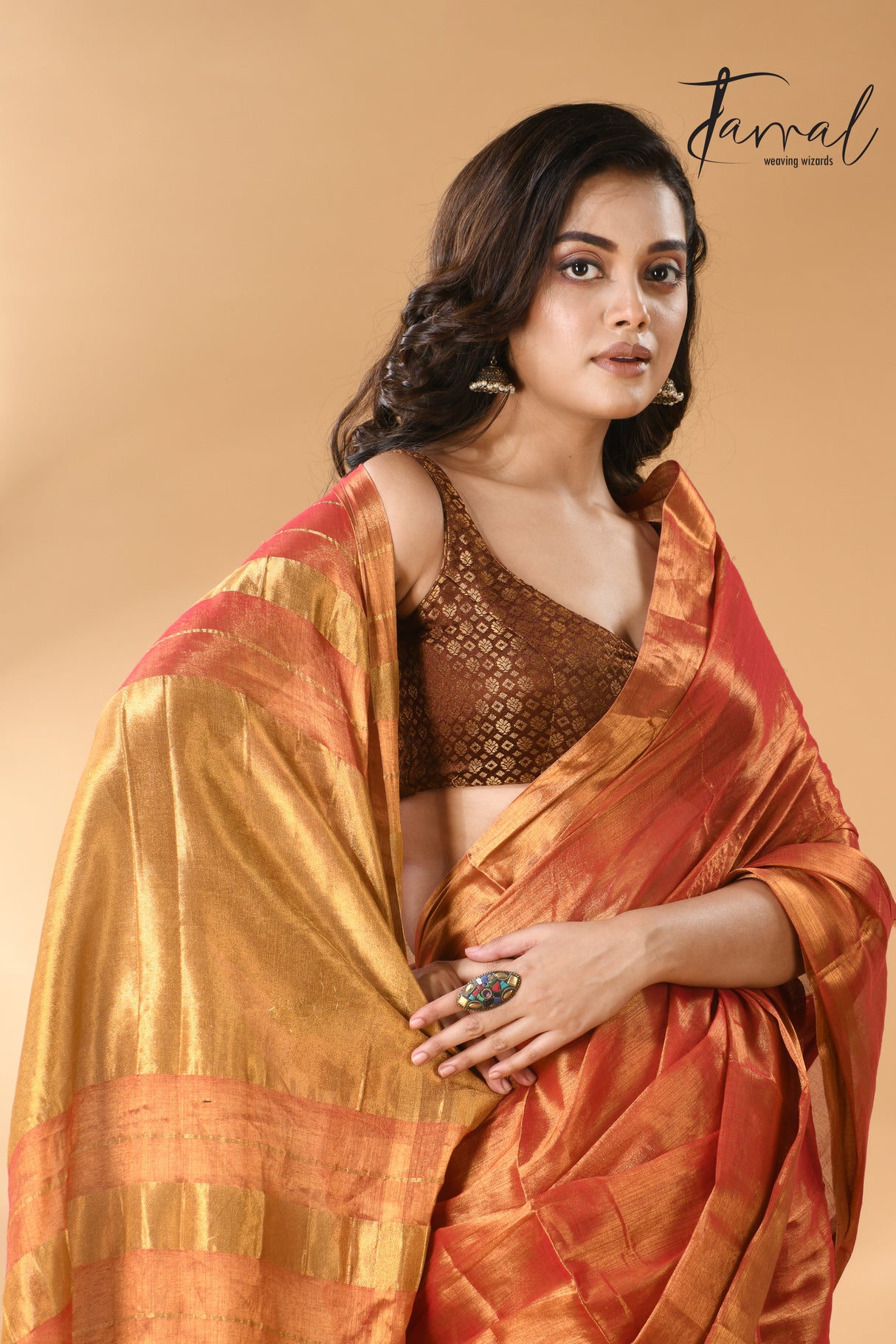 Golden orange tissue handloom saree