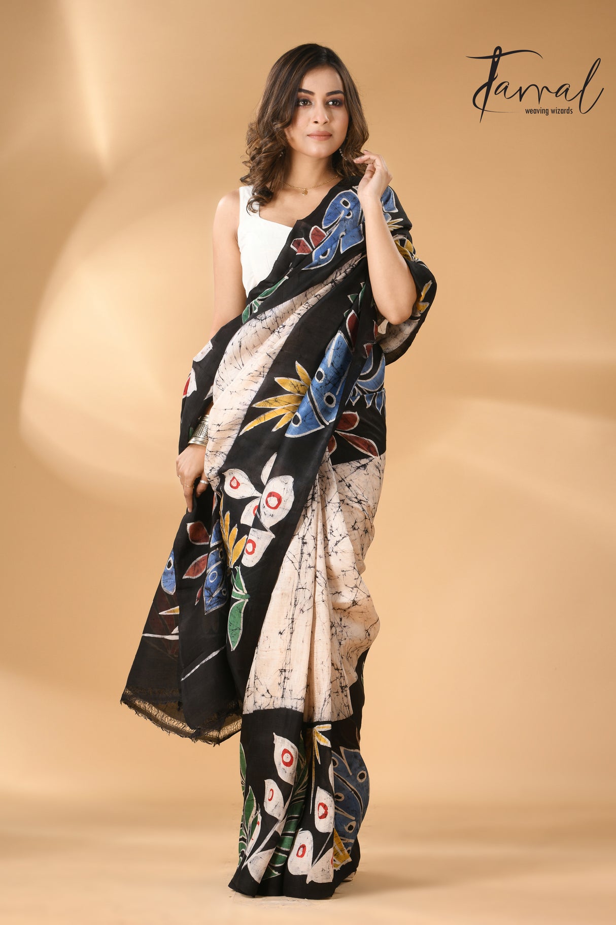 Off white with multi colour leaves hand batik design in katan silk saree