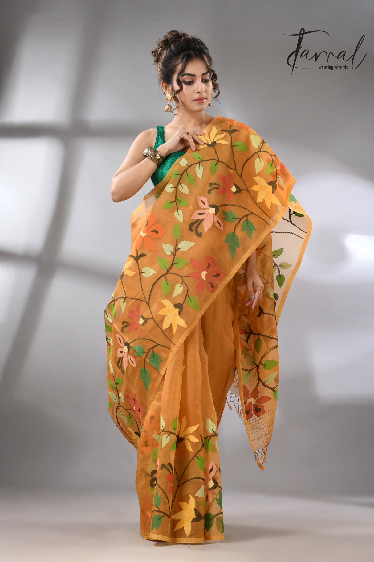 Golden yellow with multi colour floral skirt border allover handwoven muslin silk jamdani saree