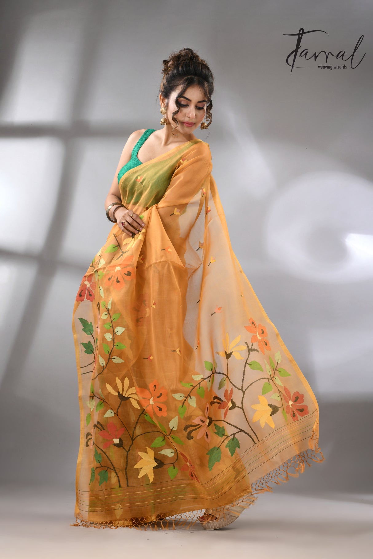 Golden yellow with multi colour floral skirt border allover handwoven muslin silk jamdani saree