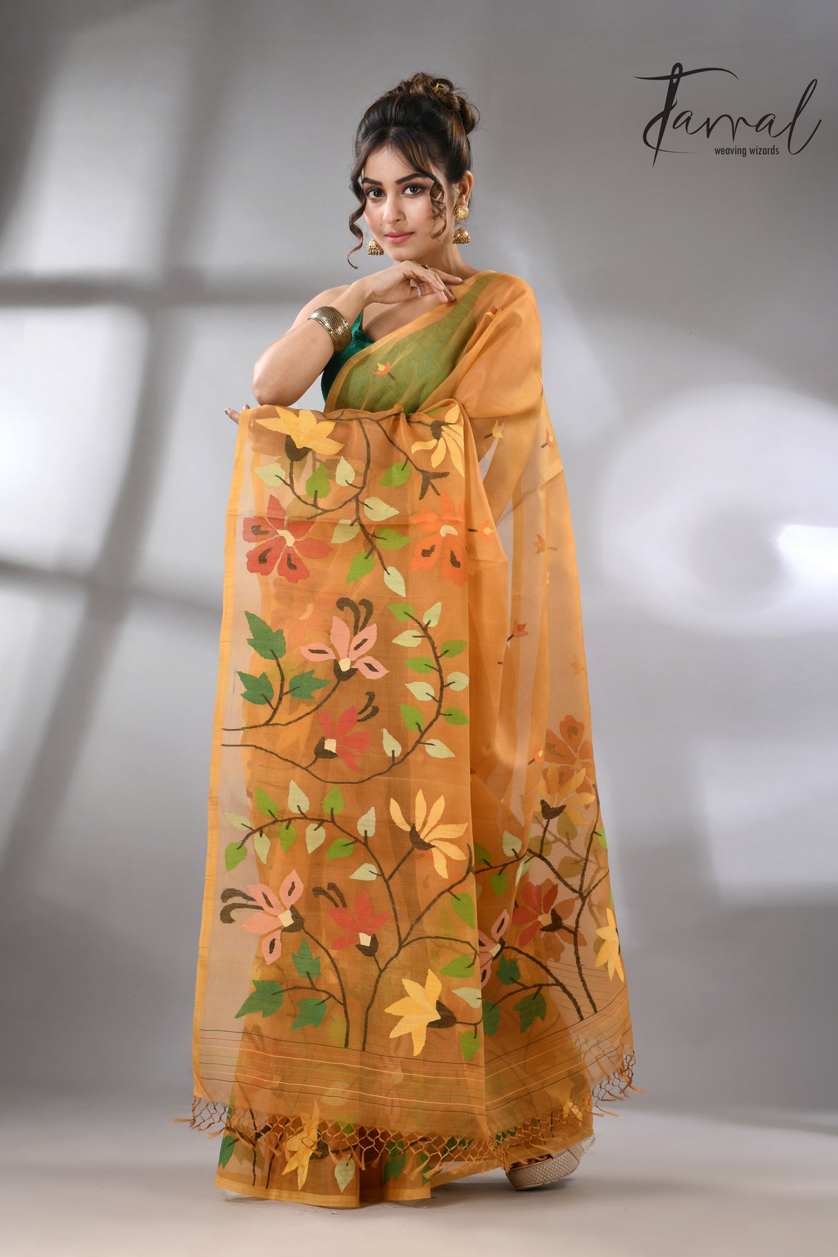 Golden yellow with multi colour floral skirt border allover handwoven muslin silk jamdani saree