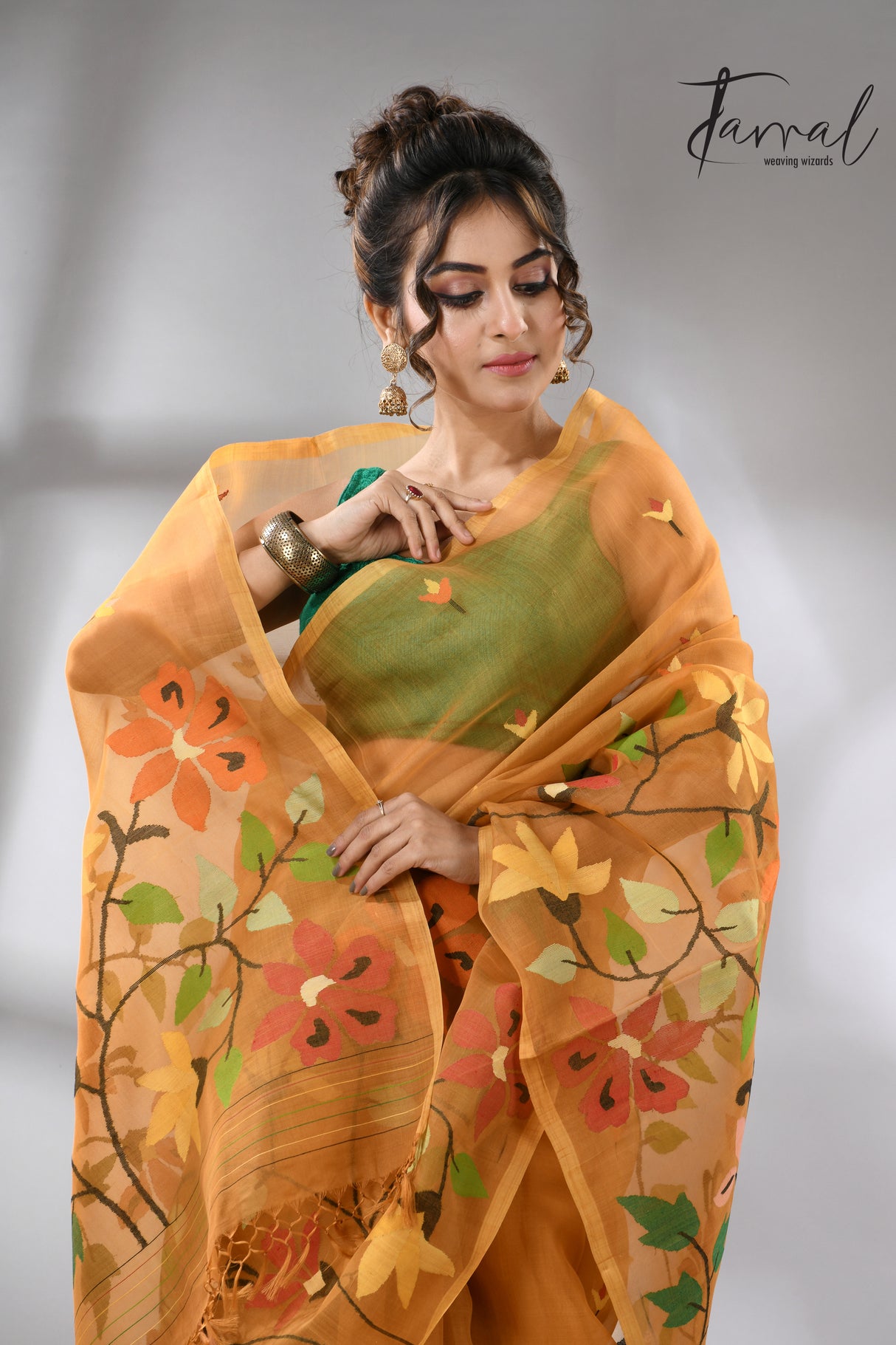 Golden yellow with multi colour floral skirt border allover handwoven muslin silk jamdani saree